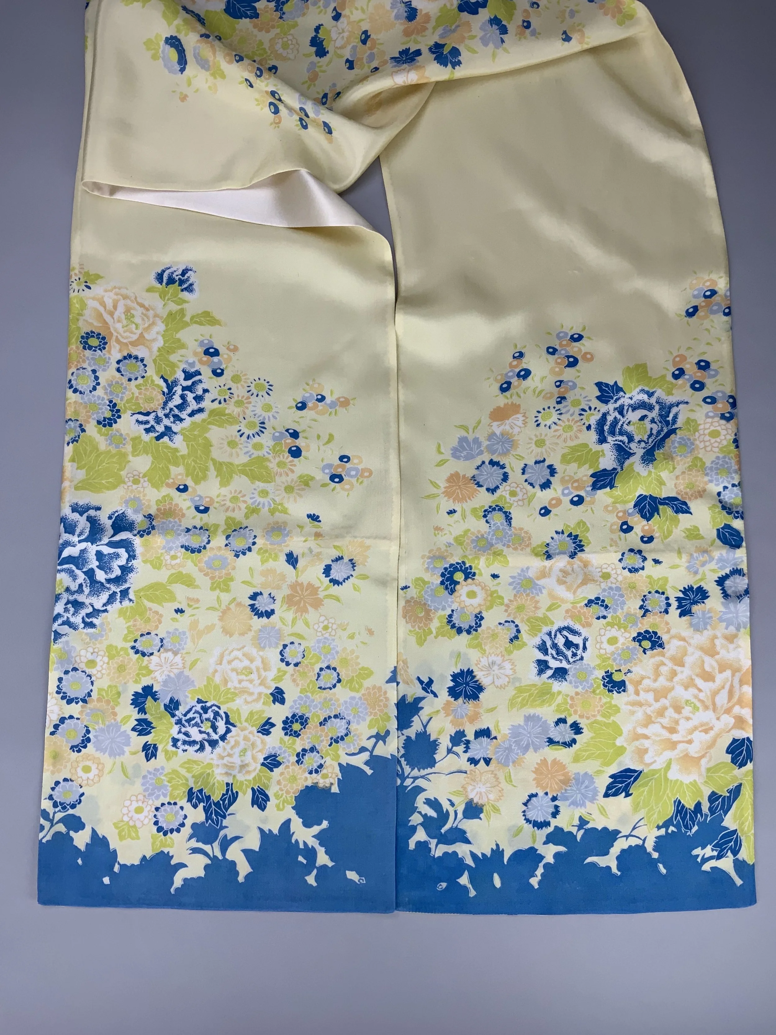 Closeup of yellow scarf with blossom print handmade from kimono fabric and silk satin by Kirsty Chivers