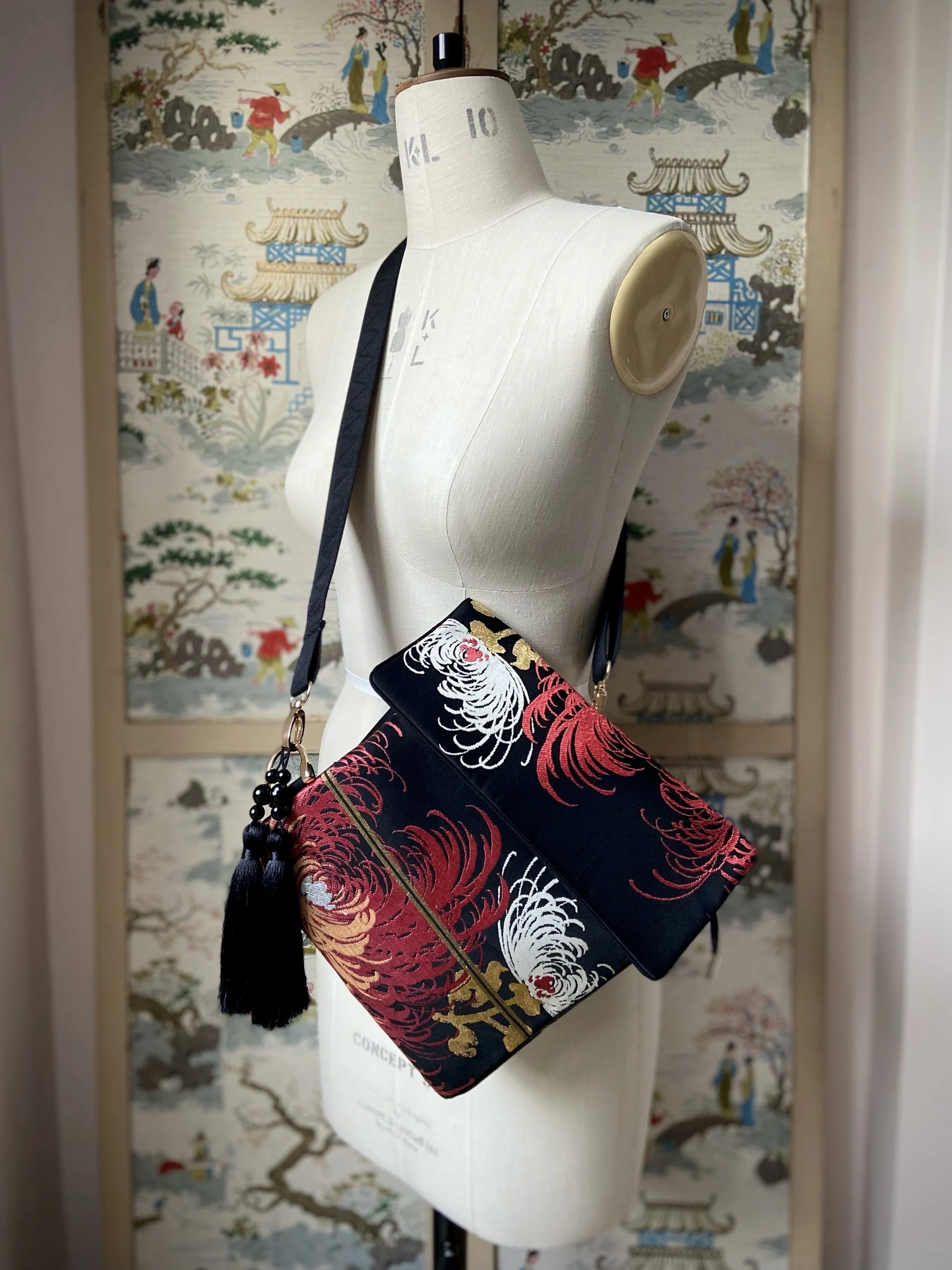 Black and crimson Chrysanthemum vintage obi silk shoulder bag with gold thread detail and black silk tassel charm by Kirsty Chivers