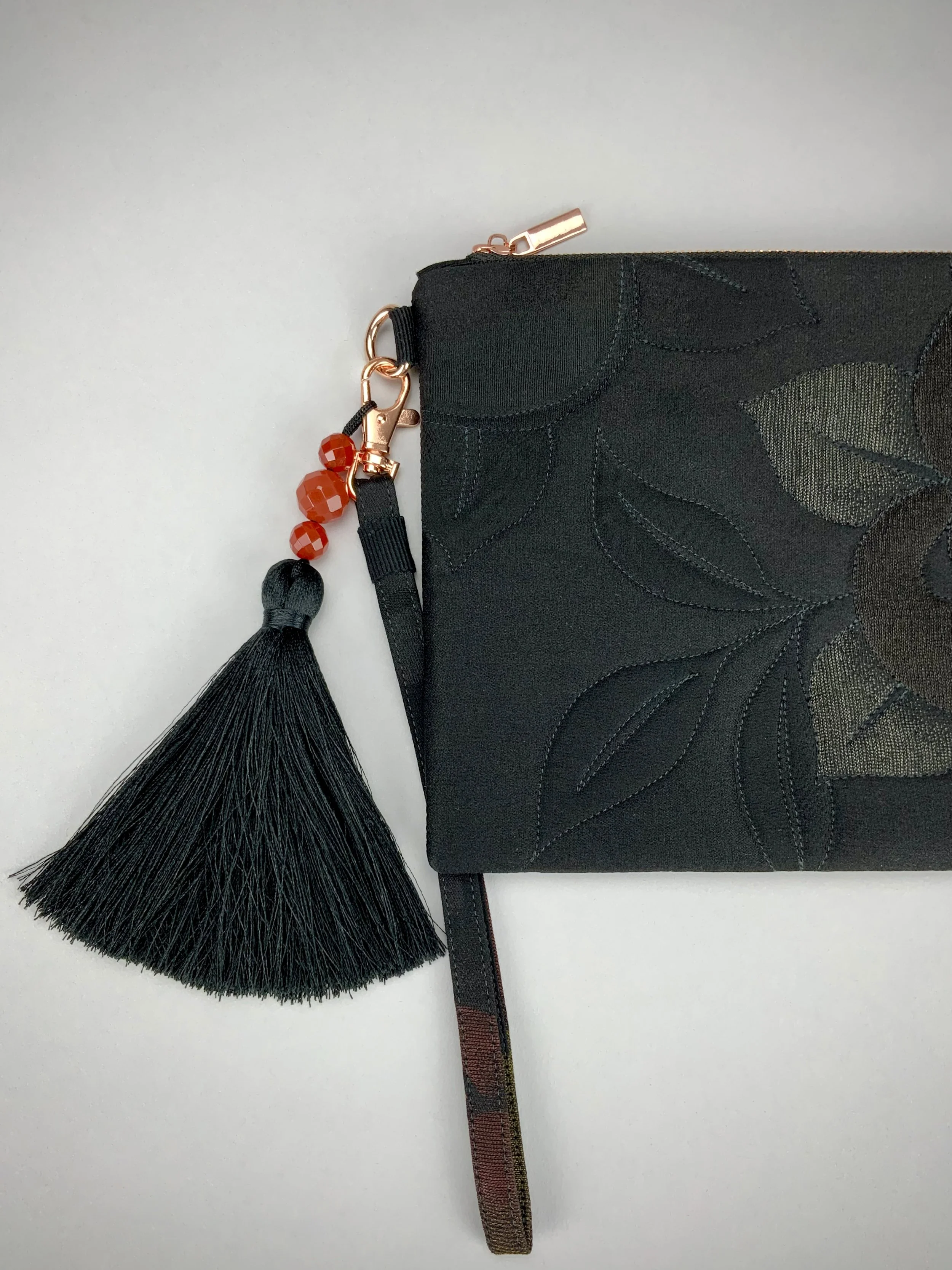 Black silk satin wristlet purse with quilted Persimmon fruit design & silk tassel, made from vintage Japanese kimono fabric by Kirsty Chivers