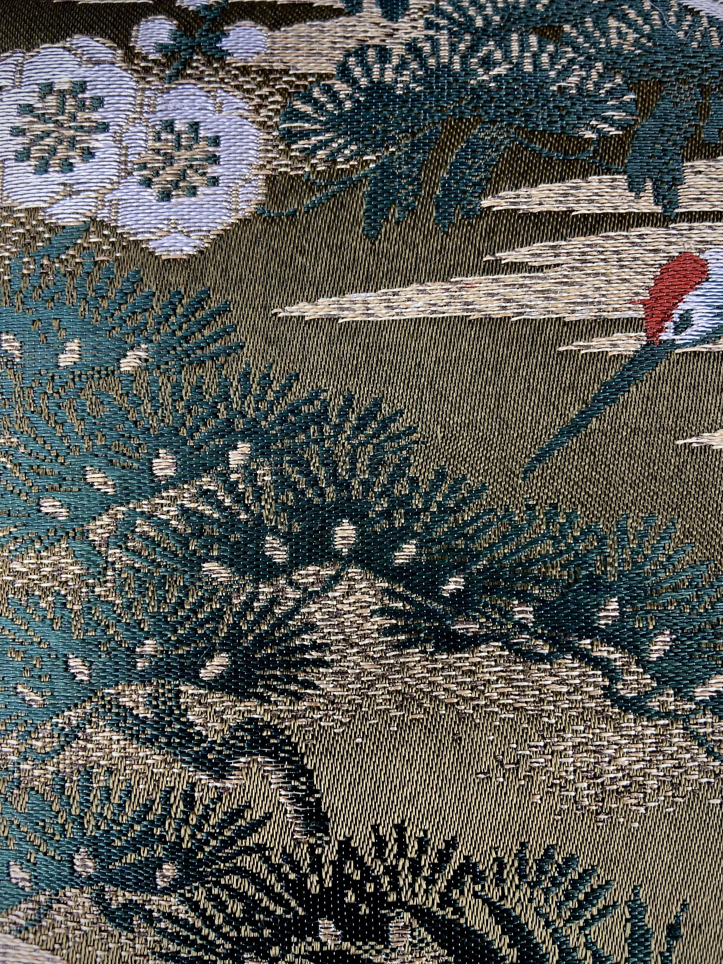 Unique Flying Crane baguette bag, handmade from vintage Japanese obi silk with gold hardware and matching silk tassel charm by Kirsty Chivers