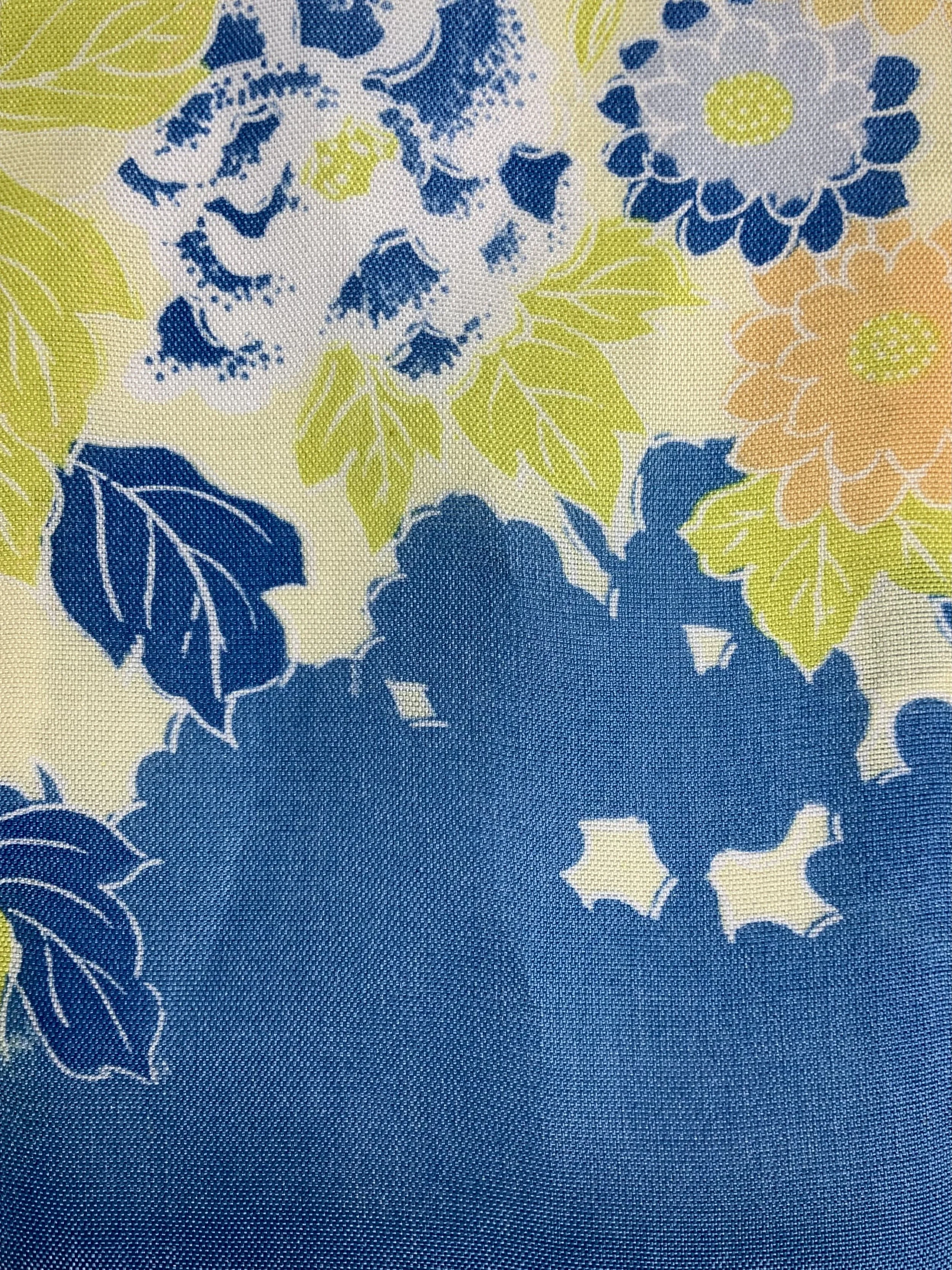 Closeup of pale yellow skinny scarf with blossom print handmade from vintage kimono fabric by Kirsty Chivers