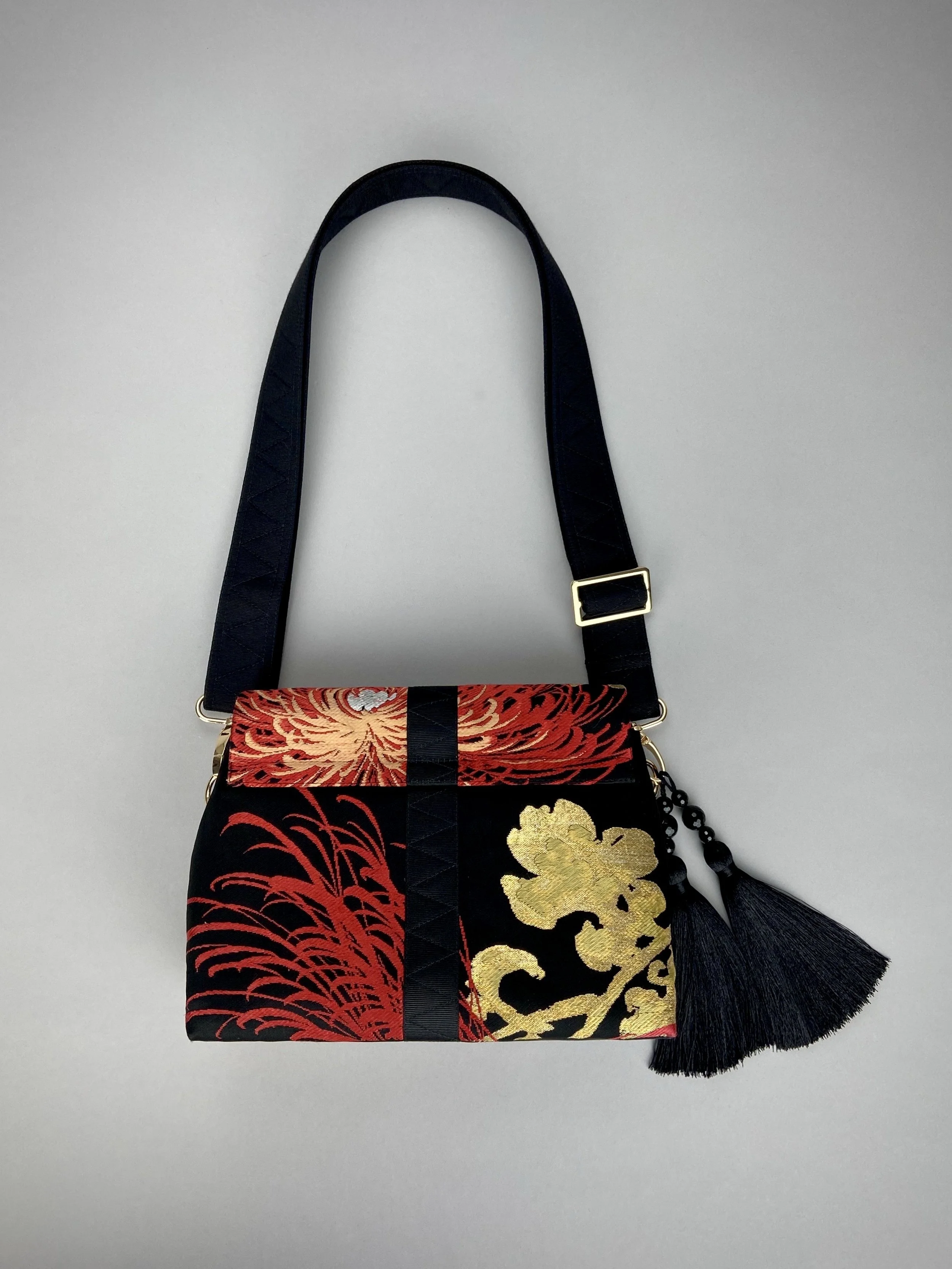 Black Chrysanthemum vintage obi silk and rayon fold bag with gold hardware and black silk tassel charm by Kirsty Chivers