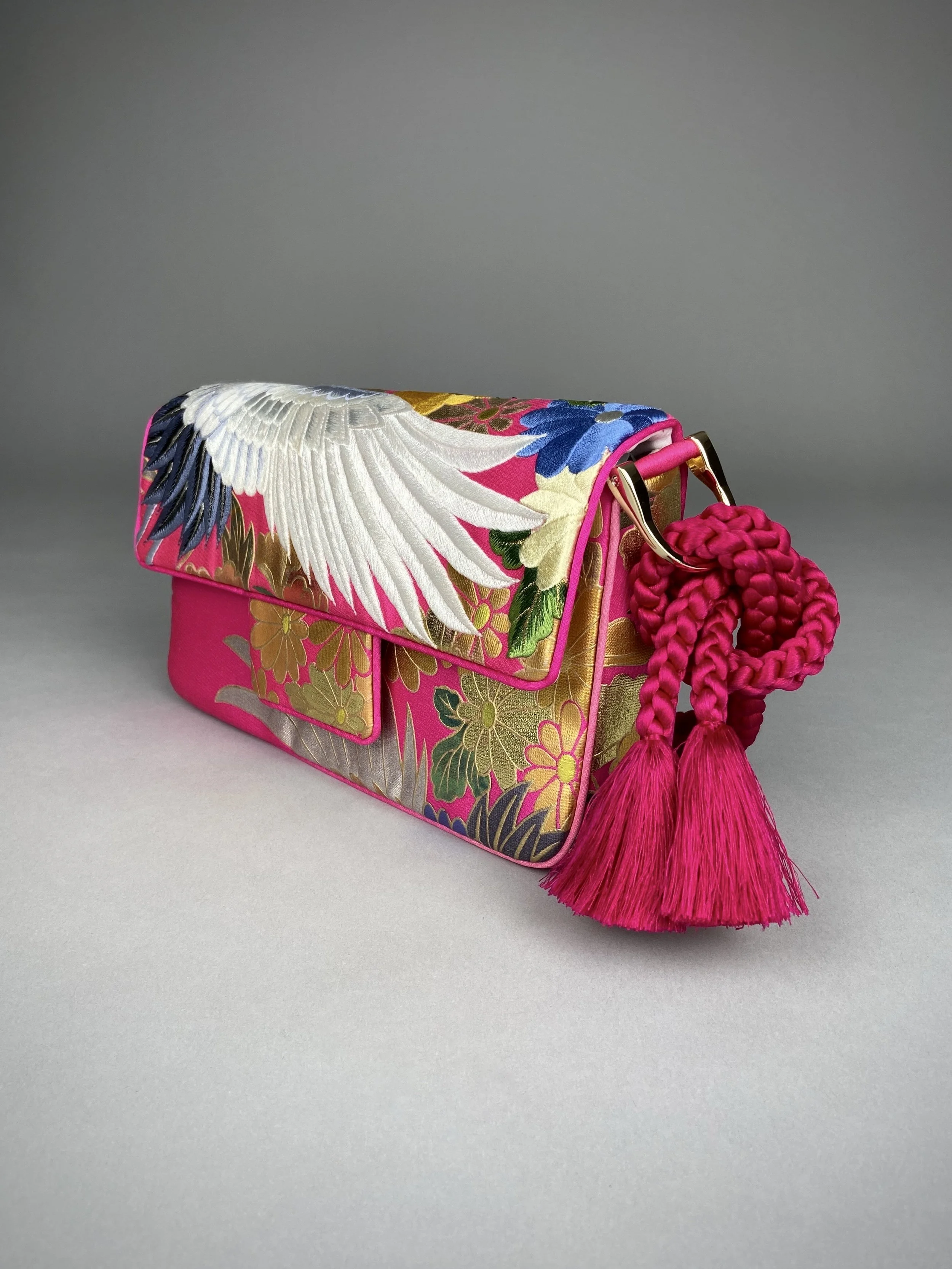 Cherry Pink Crane Feather baguette bag, handmade from vintage Japanese kimono silk with tasseled obijime cord strap by Kirsty Chivers