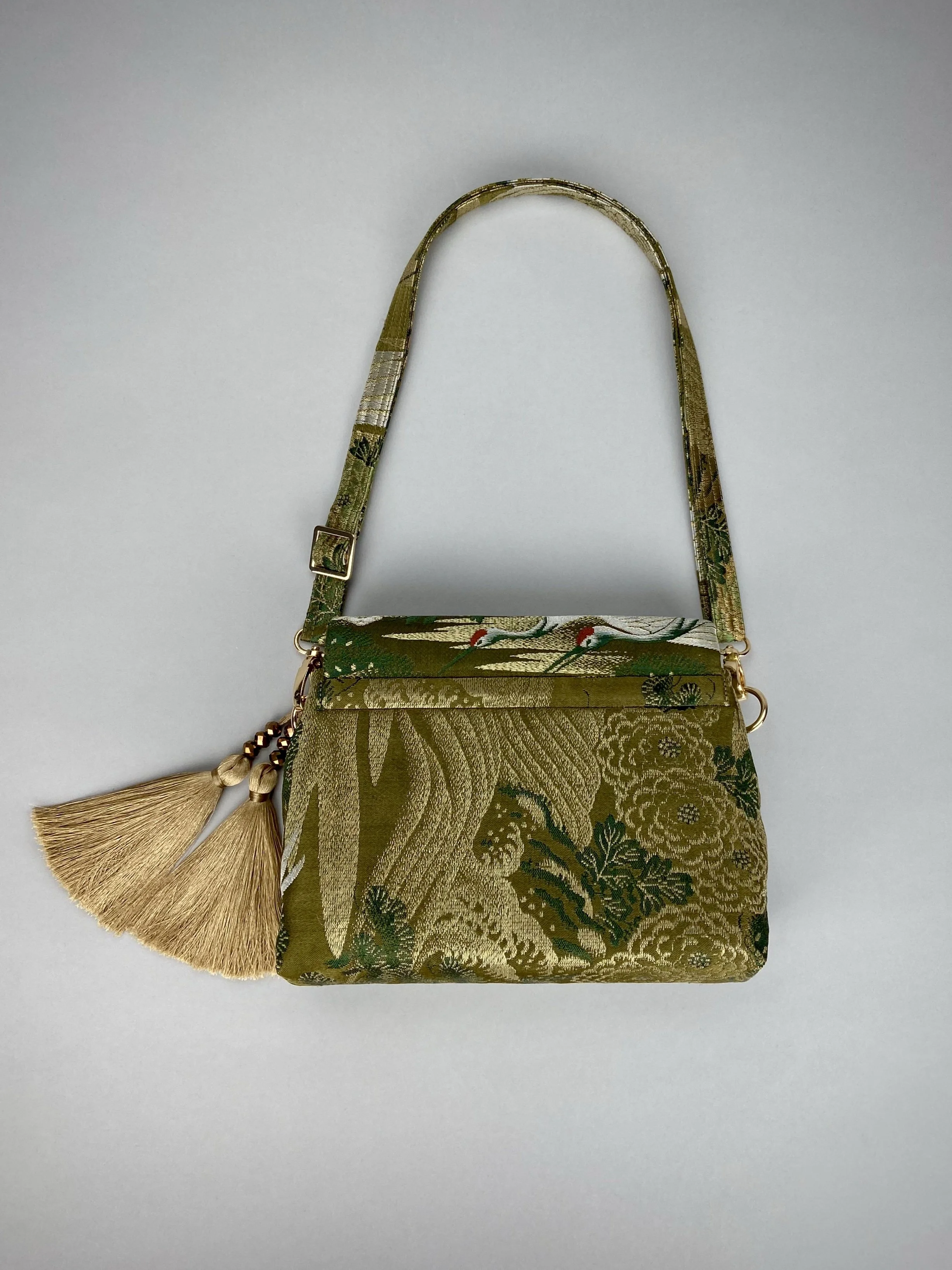 Green Flying Crane evening bag, made from repurposed vintage Japanese obi silk by Kirsty Chivers