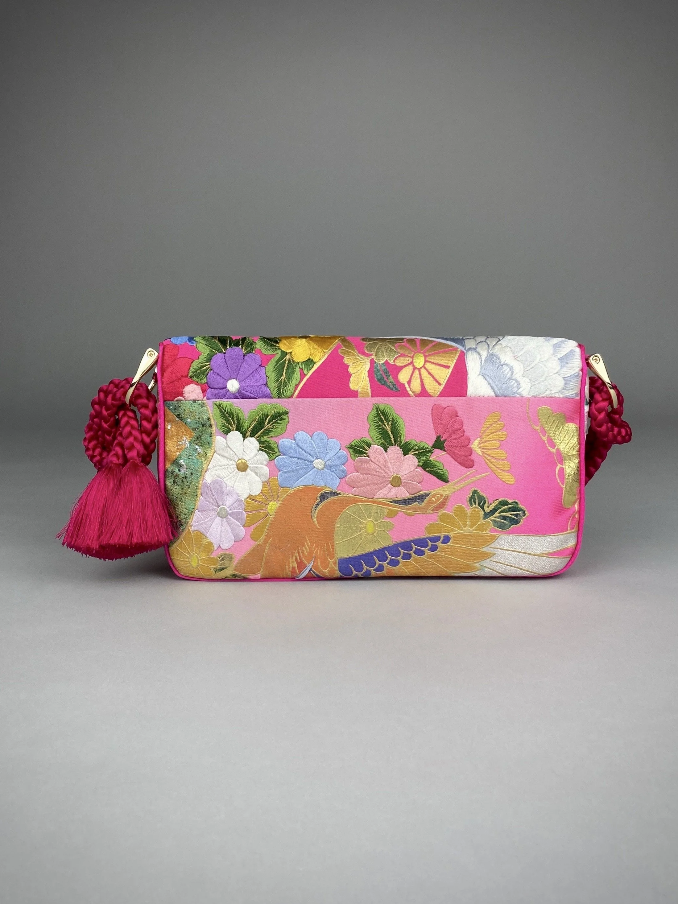 Cherry Pink Crane Feather baguette bag, handmade from vintage Japanese kimono silk with tasseled obijime cord strap by Kirsty Chivers
