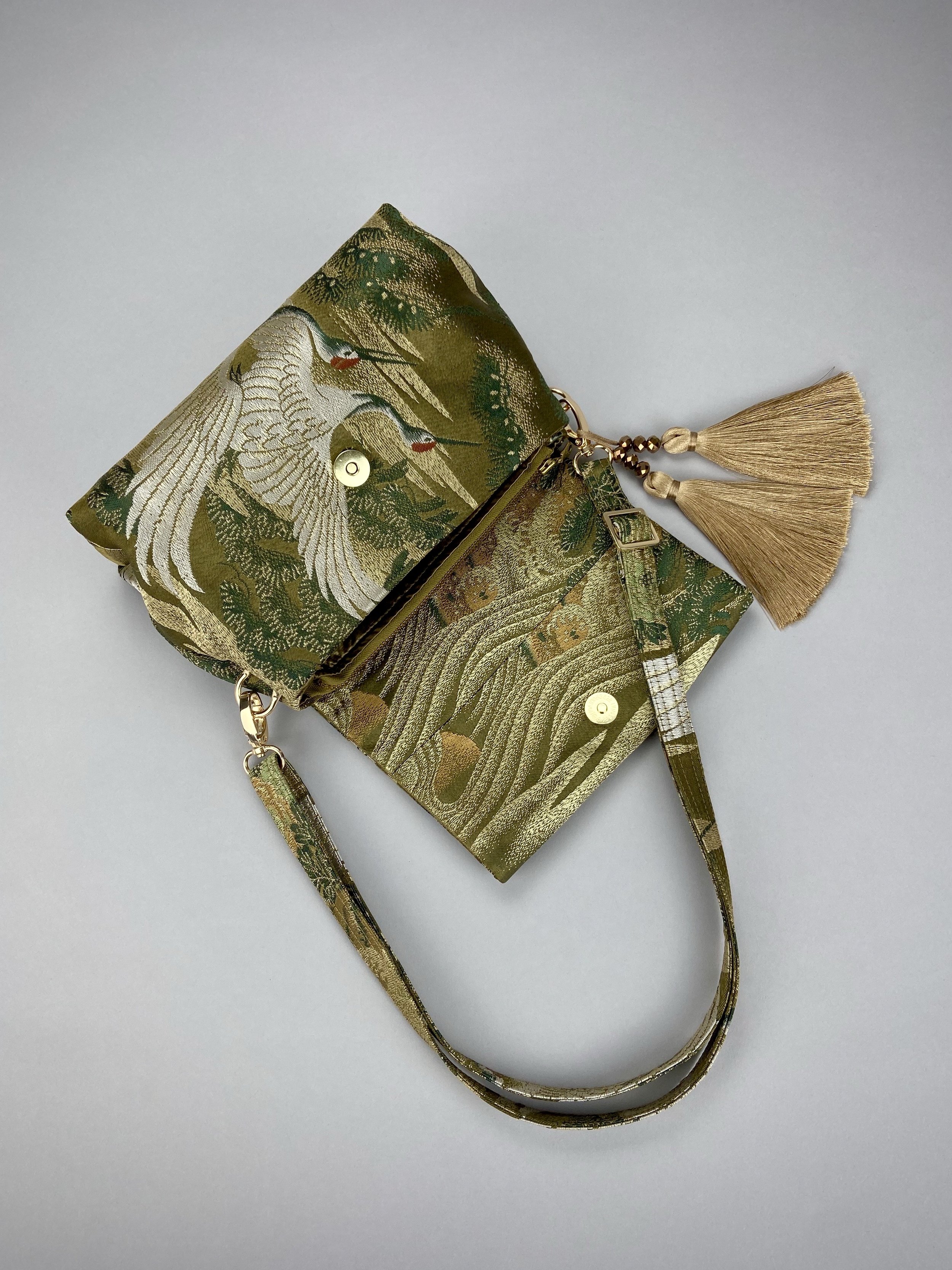 Green Flying Crane evening bag, made from repurposed vintage Japanese obi silk by Kirsty Chivers