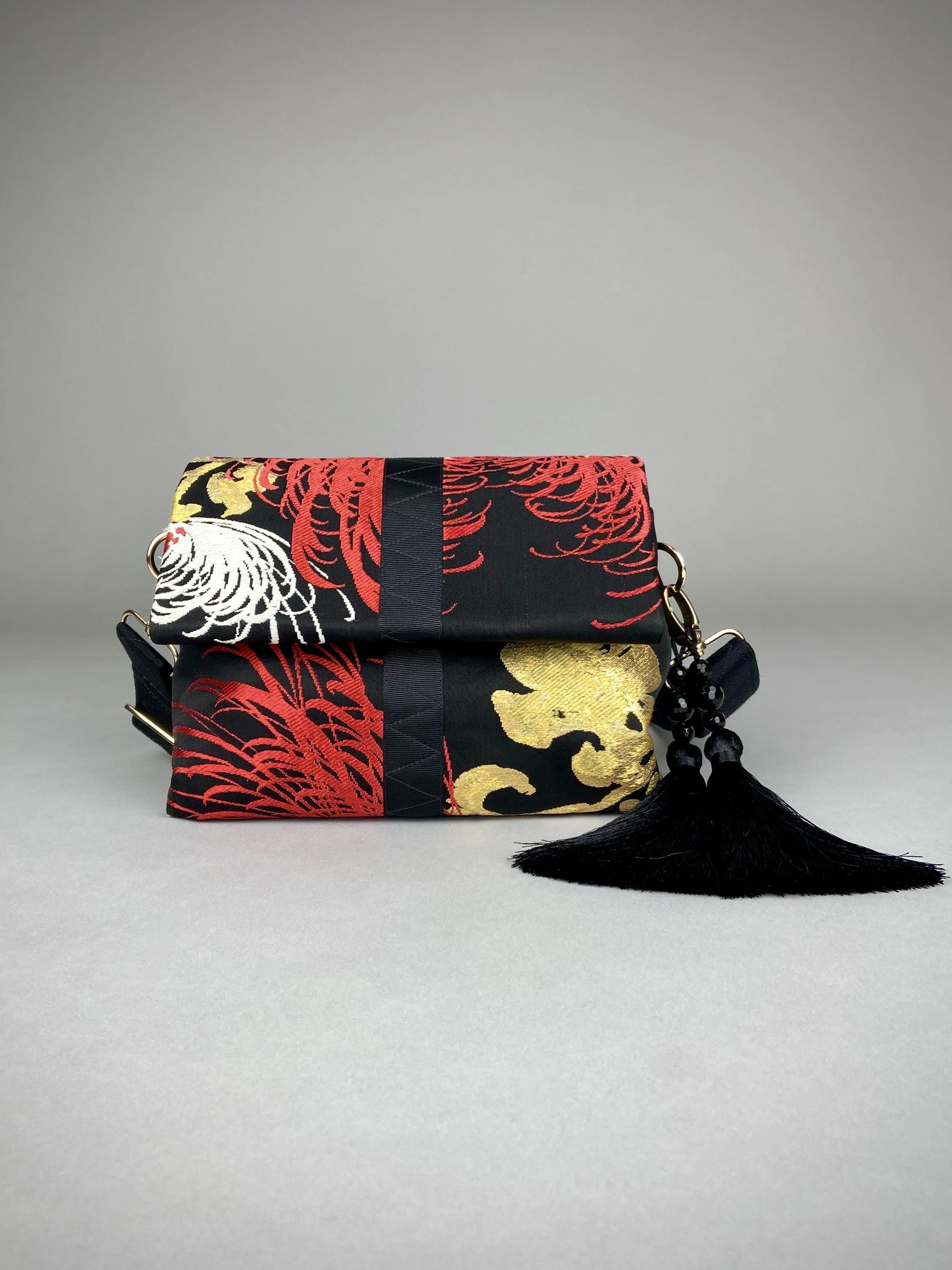 Black Chrysanthemum vintage obi silk and rayon fold bag with gold hardware and black silk tassel charm by Kirsty Chivers