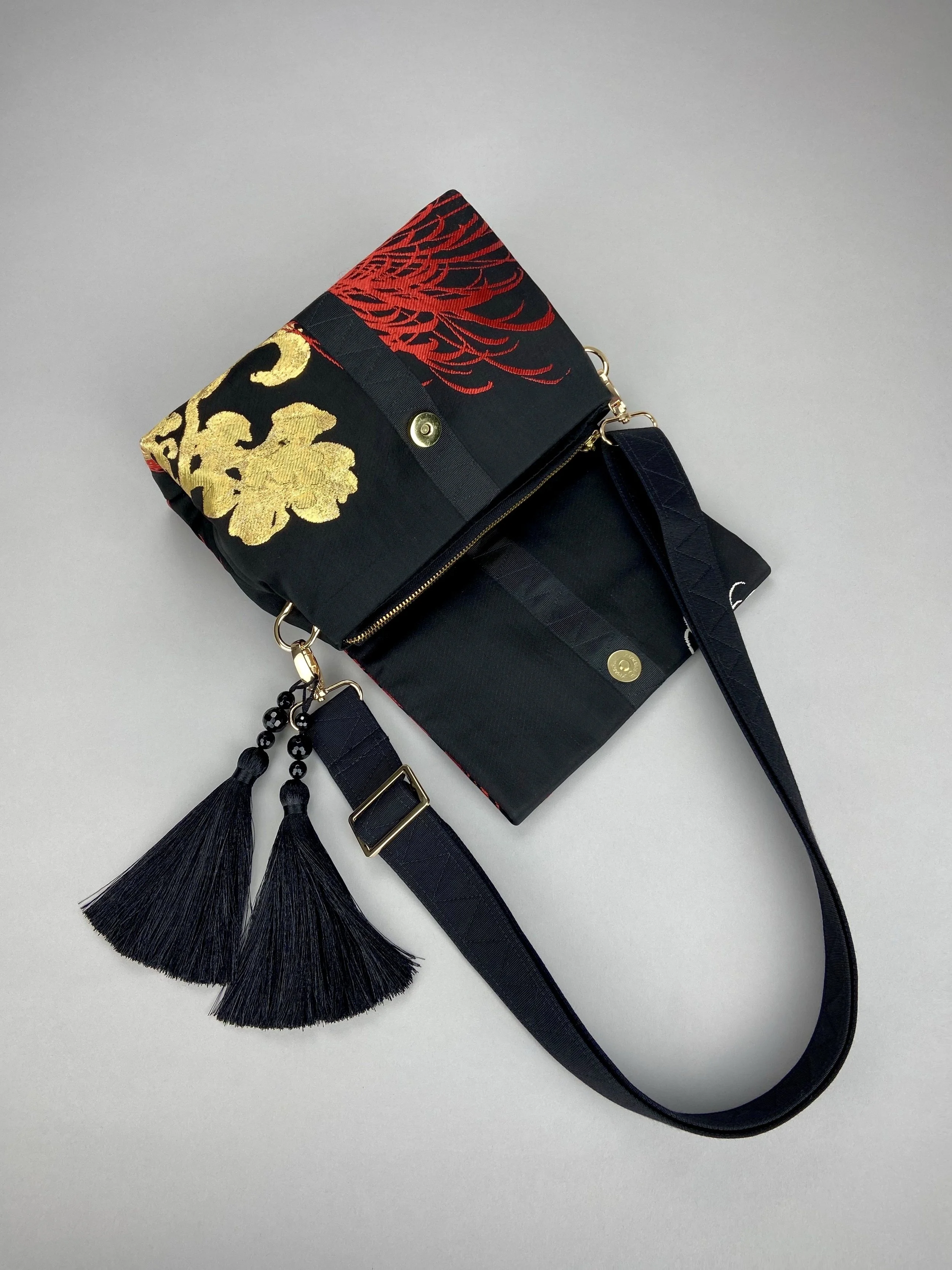 Black Chrysanthemum vintage obi silk and rayon fold bag with gold hardware and black silk tassel charm by Kirsty Chivers