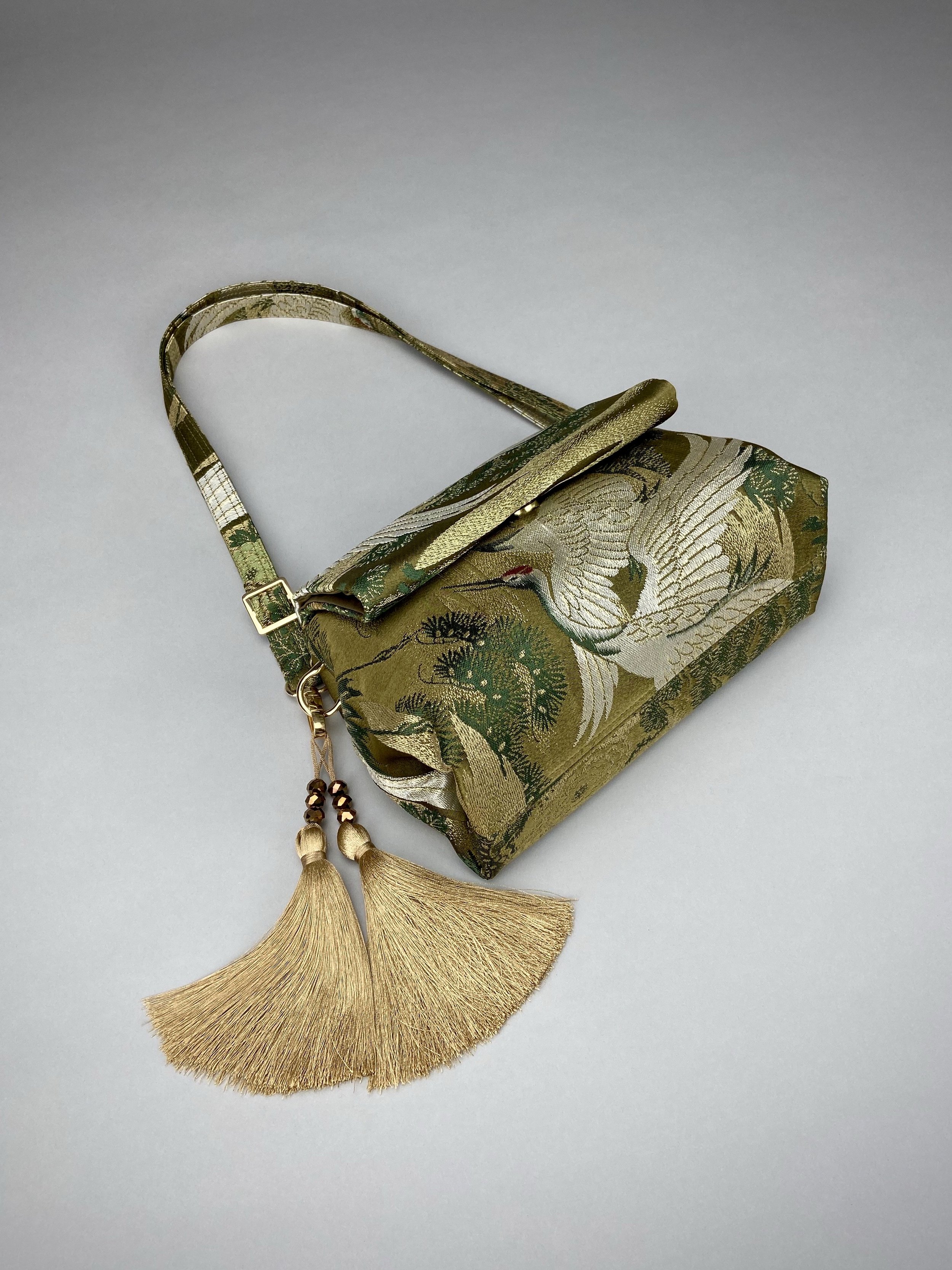 Green Flying Crane evening bag, made from repurposed vintage Japanese obi silk by Kirsty Chivers