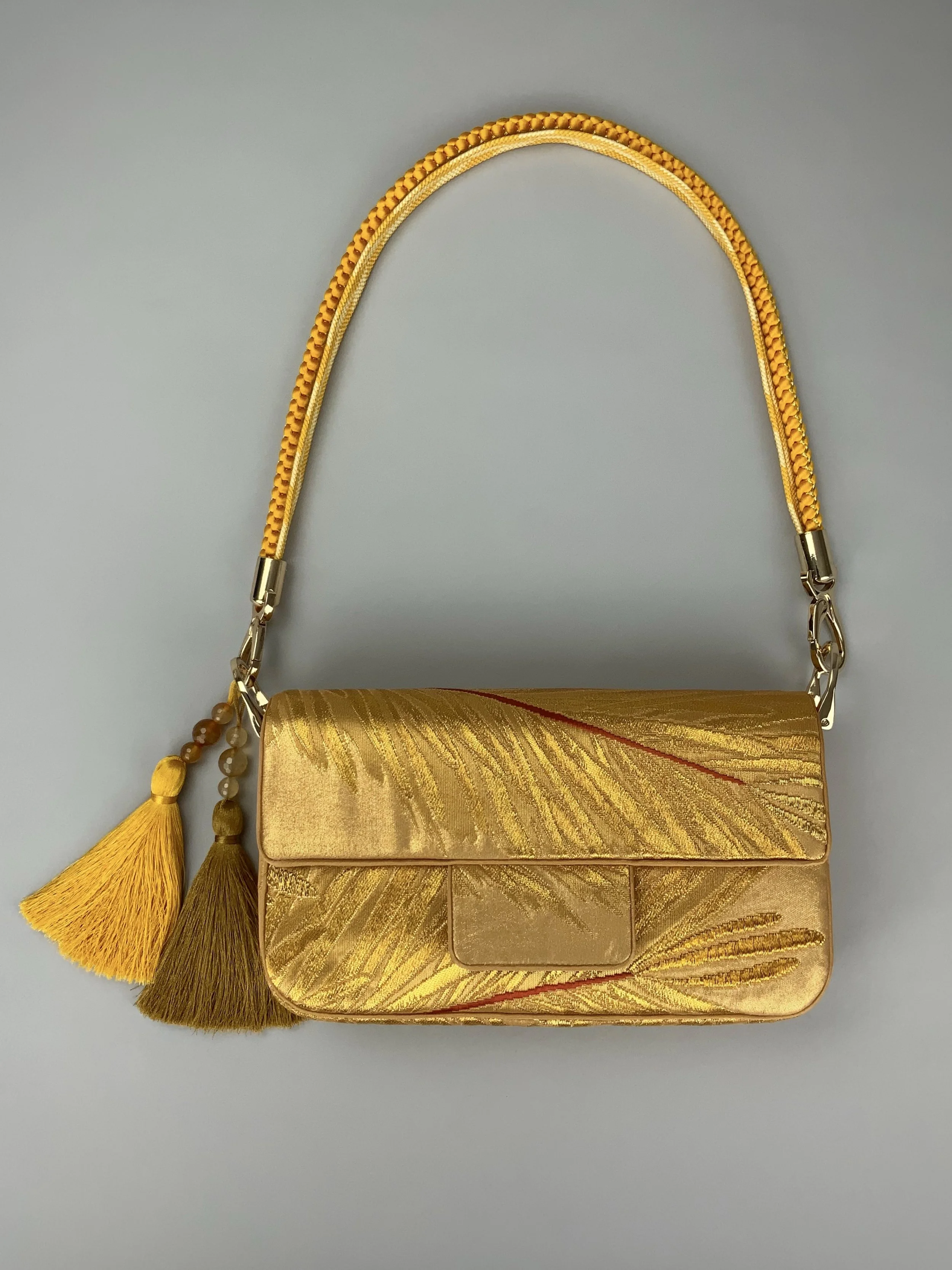 Lustrous metallic gold baguette evening bag made from vintage Japanese obi silk by Kirsty Chivers