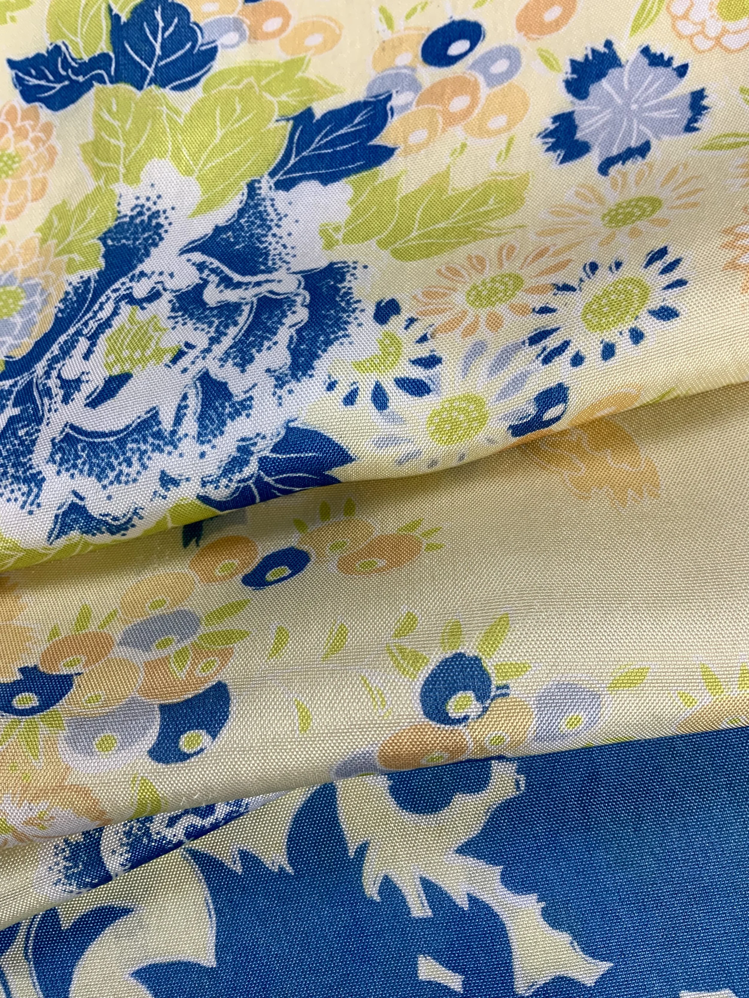 Closeup of yellow scarf with blossom print handmade from kimono fabric and silk satin by Kirsty Chivers