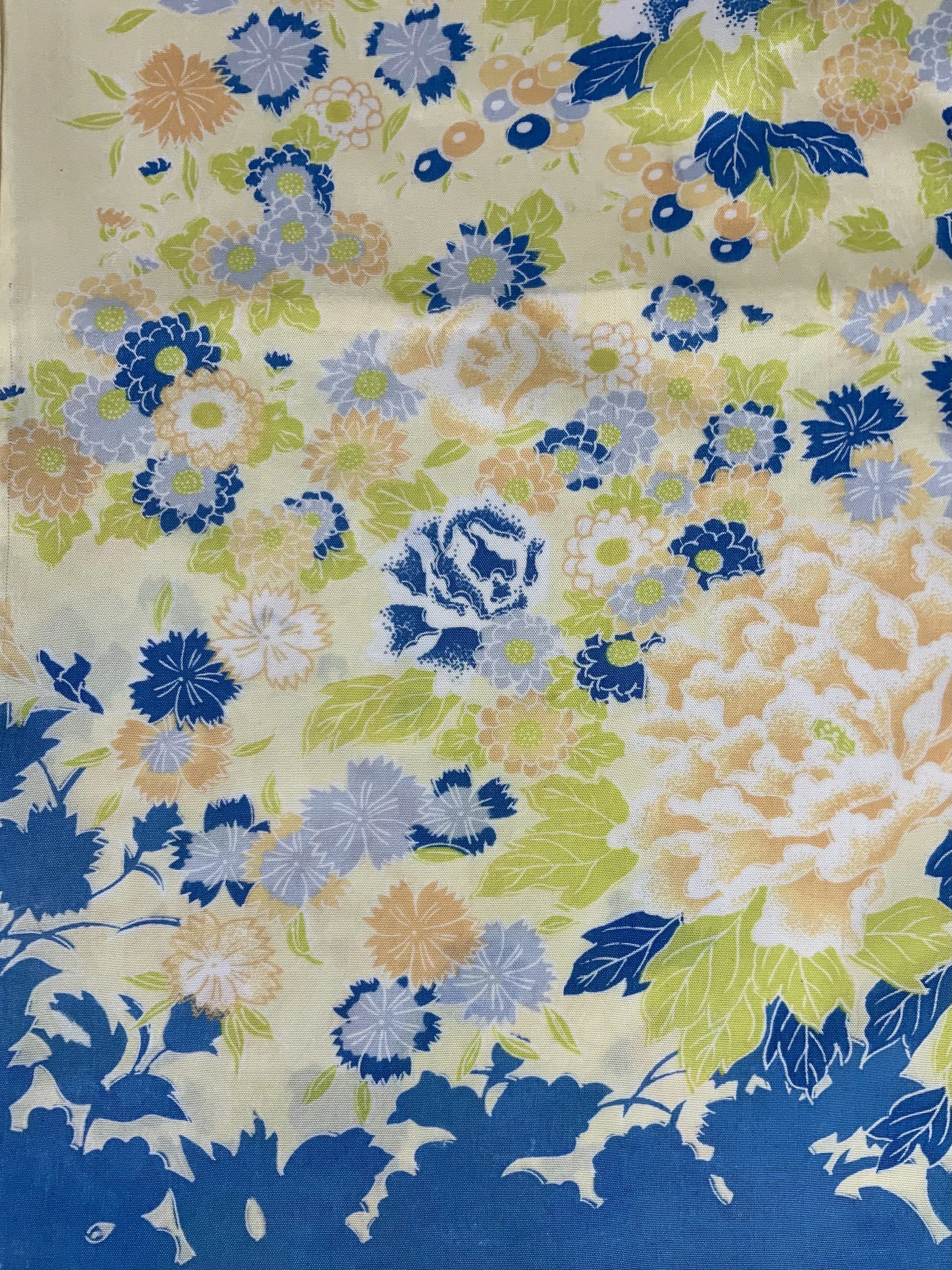 Closeup of yellow scarf with blossom print handmade from kimono fabric and silk satin by Kirsty Chivers