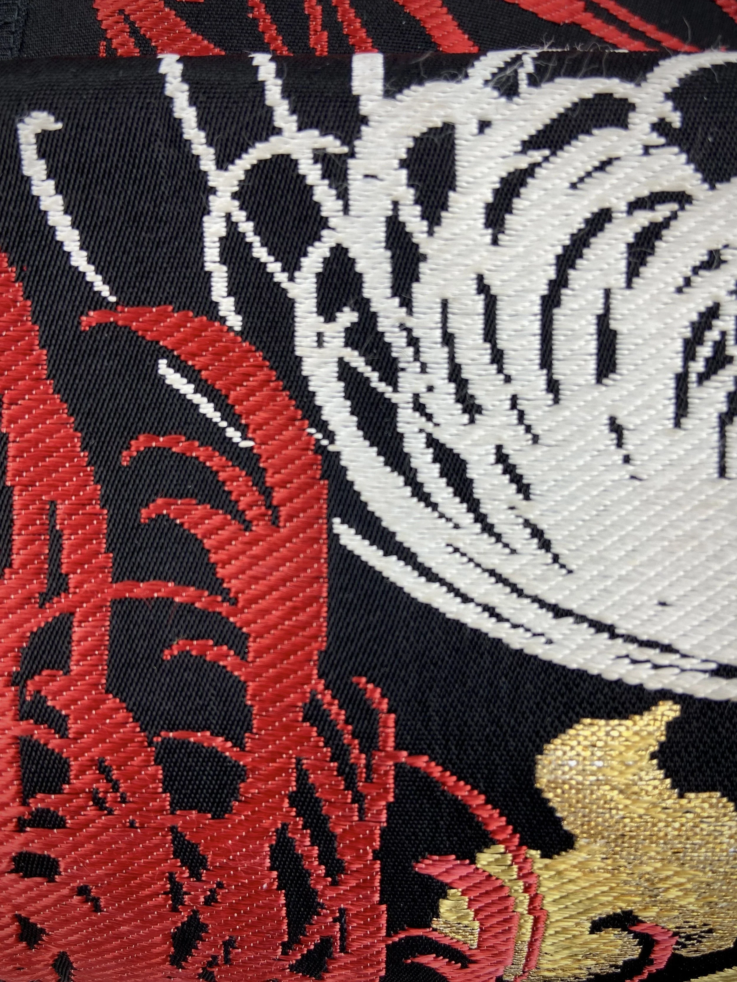 Black Chrysanthemum vintage obi silk and rayon fold bag with gold hardware and black silk tassel charm by Kirsty Chivers