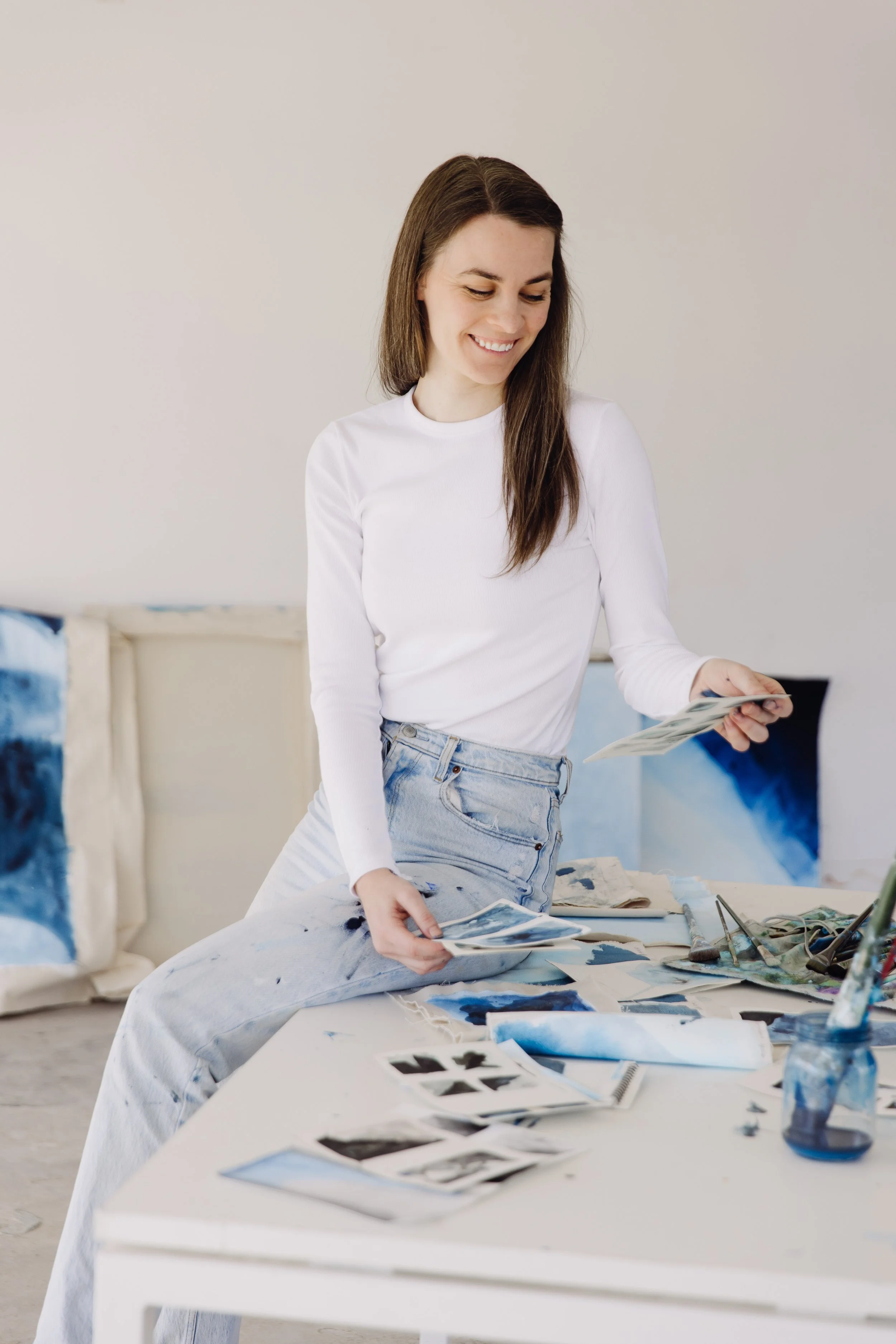 Meg O'Hara artist in painting studio