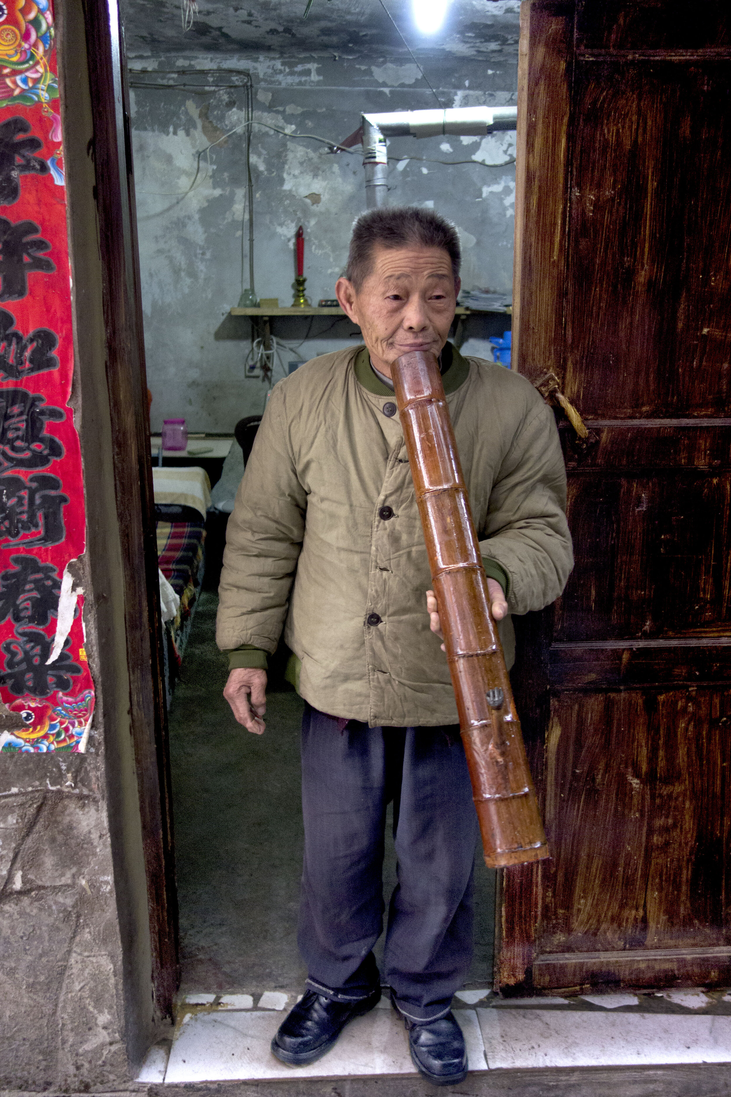 Miao Man with Flute, Guazhou