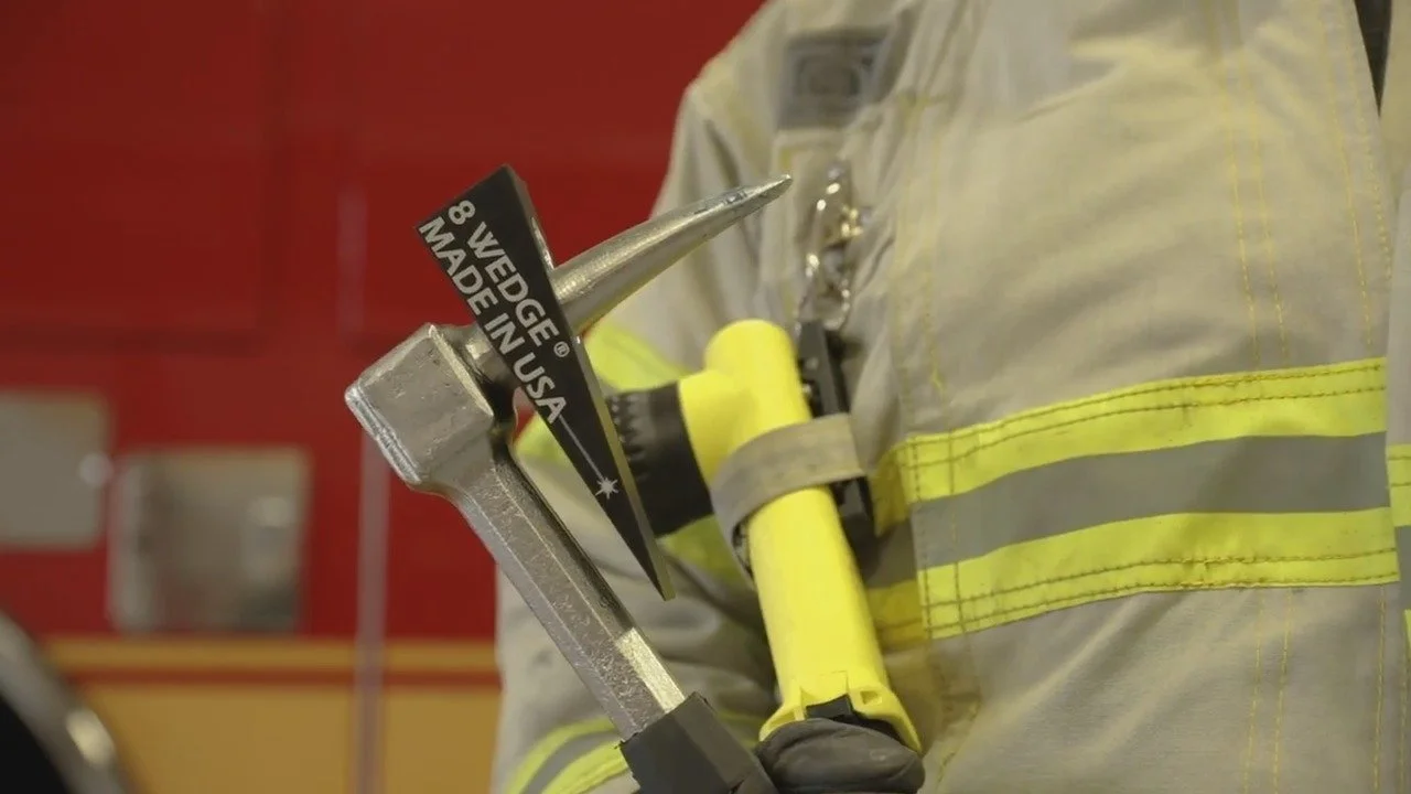 forcible entry wedge carried by firefighter