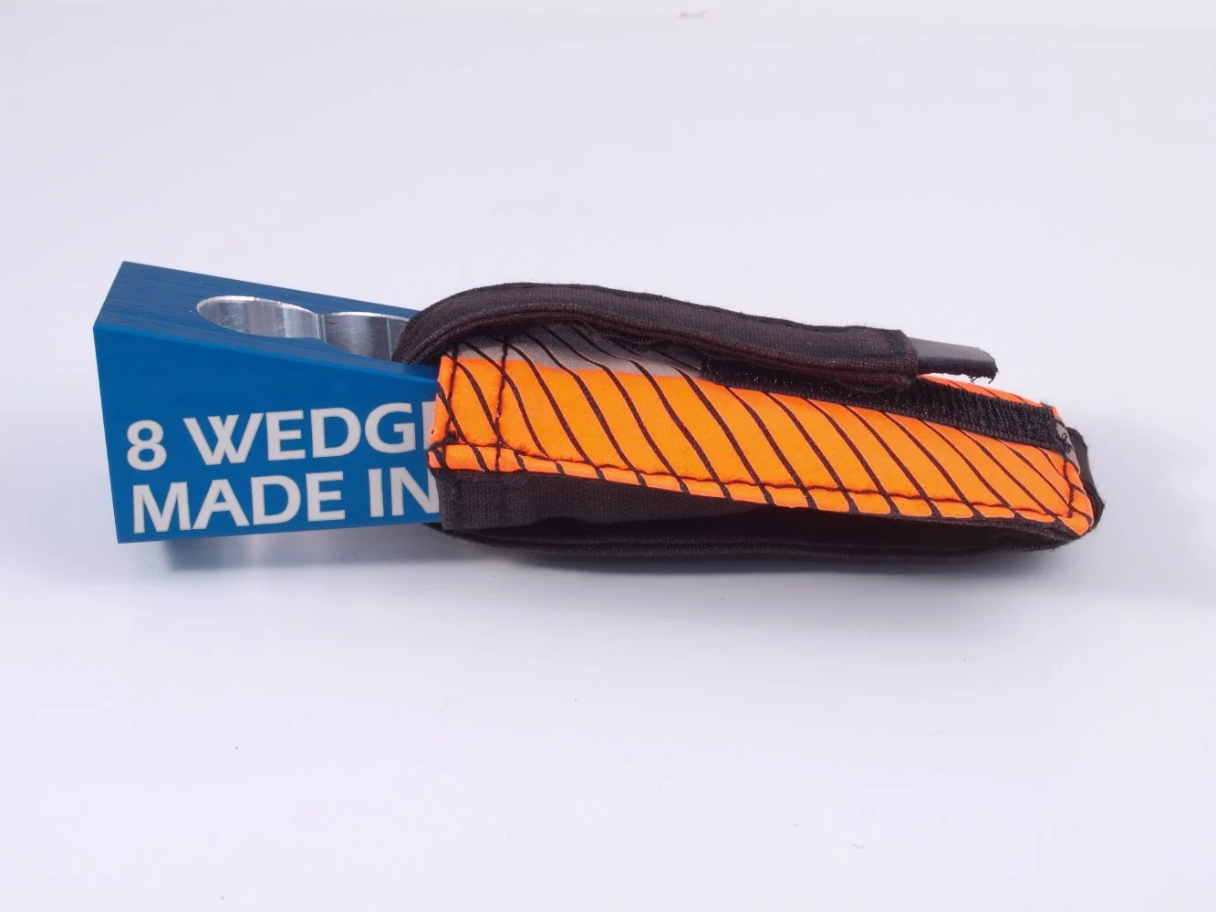 8 WEDGE firefighter door wedge tool stored in STRP pouch carry system attached to gear for quick access