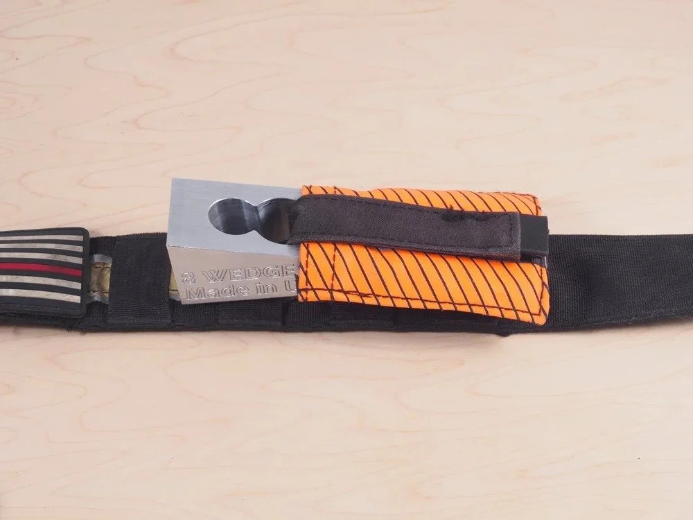 STRP firefighter tool pouch mounted on gear strap showing low profile and accessible tool carry