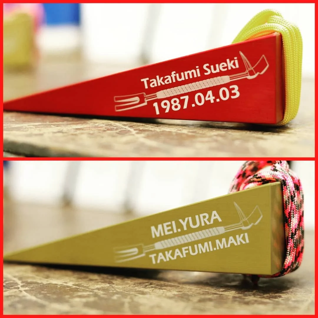 Custom engraved 8 WEDGE firefighter door wedge tool with personalized name and markings on anodized aluminum wedge