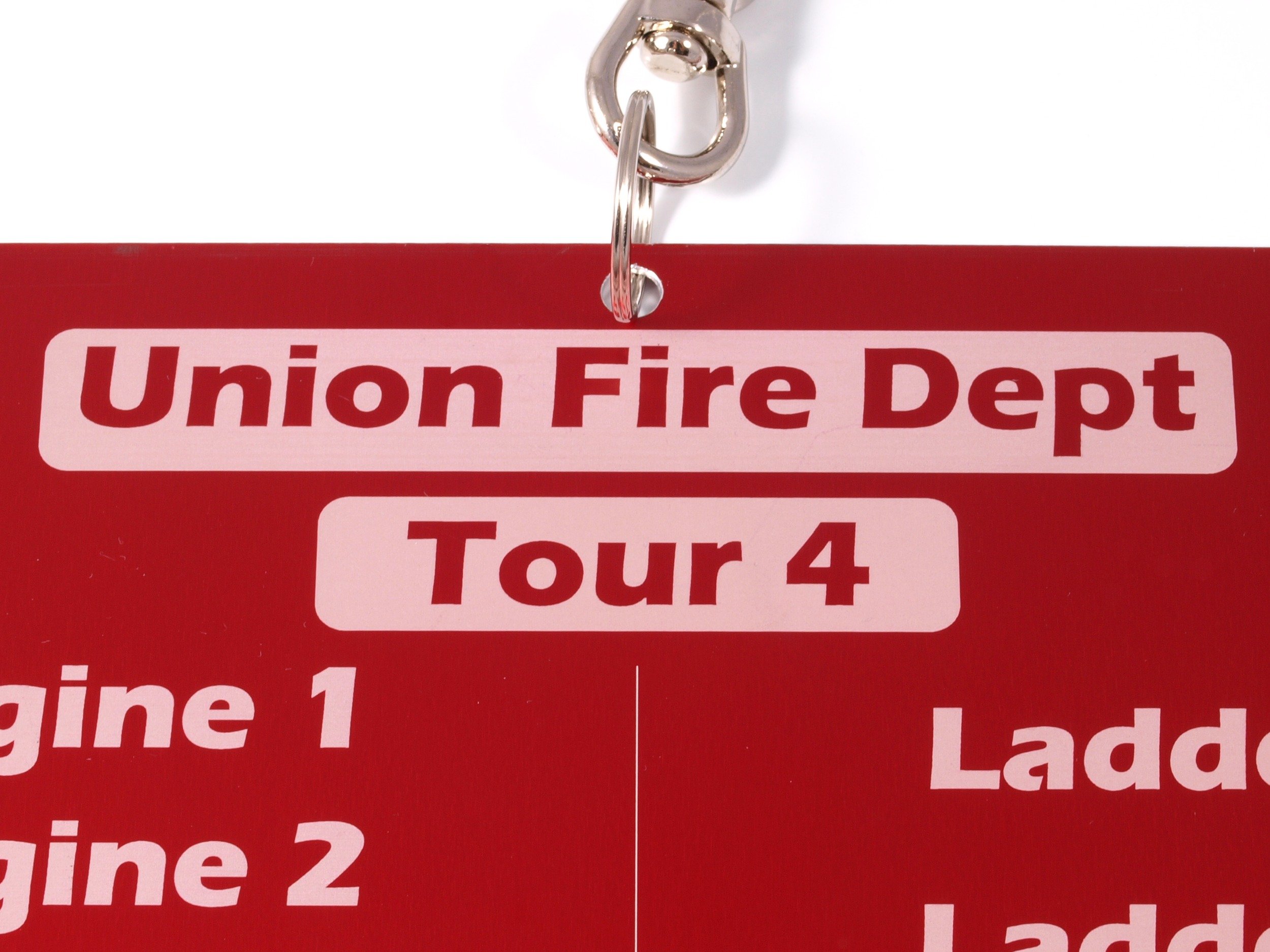 Firefighter accountability tags with apparatus and assignment labels for incident tracking