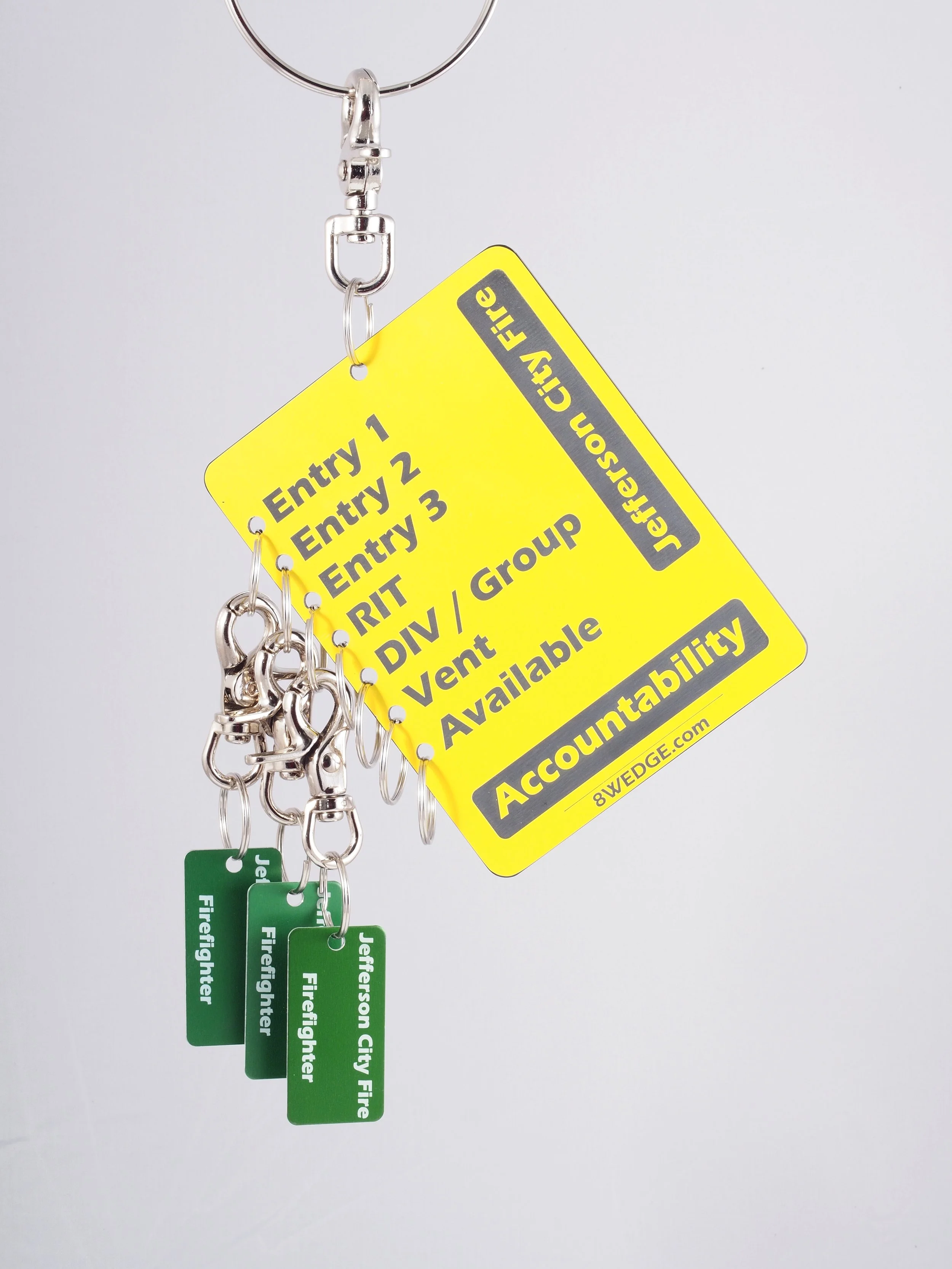 Firefighter apparatus tags showing crew assignments including entry RIT division and vent roles for accountability tracking