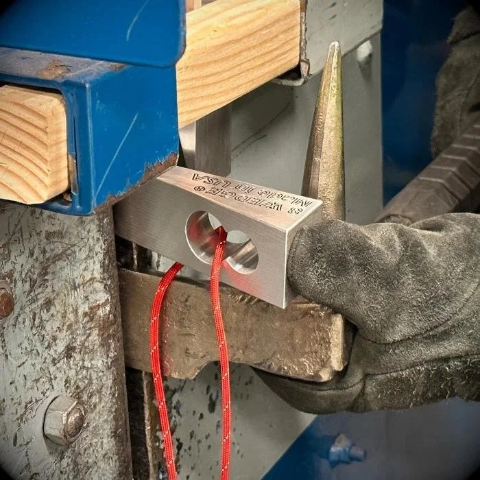 8 WEDGE being used to force a door