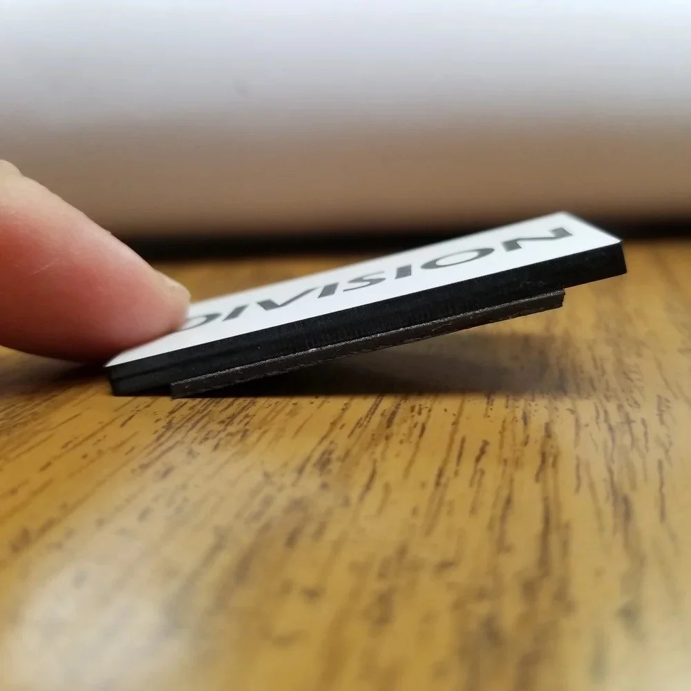 Magnetic firefighter tags side profile showing thickness and durable construction for repeated command board use