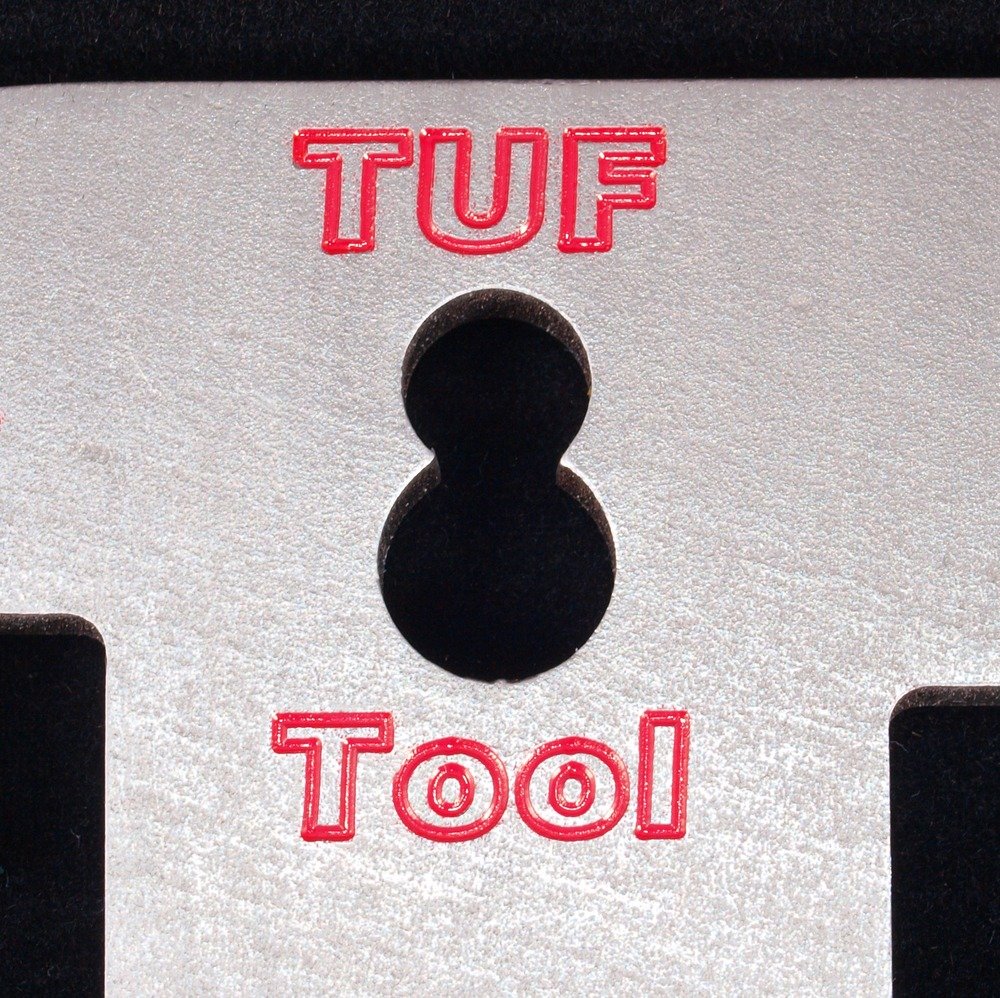 close up of TUF 8 firefighter multi tool engraving and machined aluminum surface