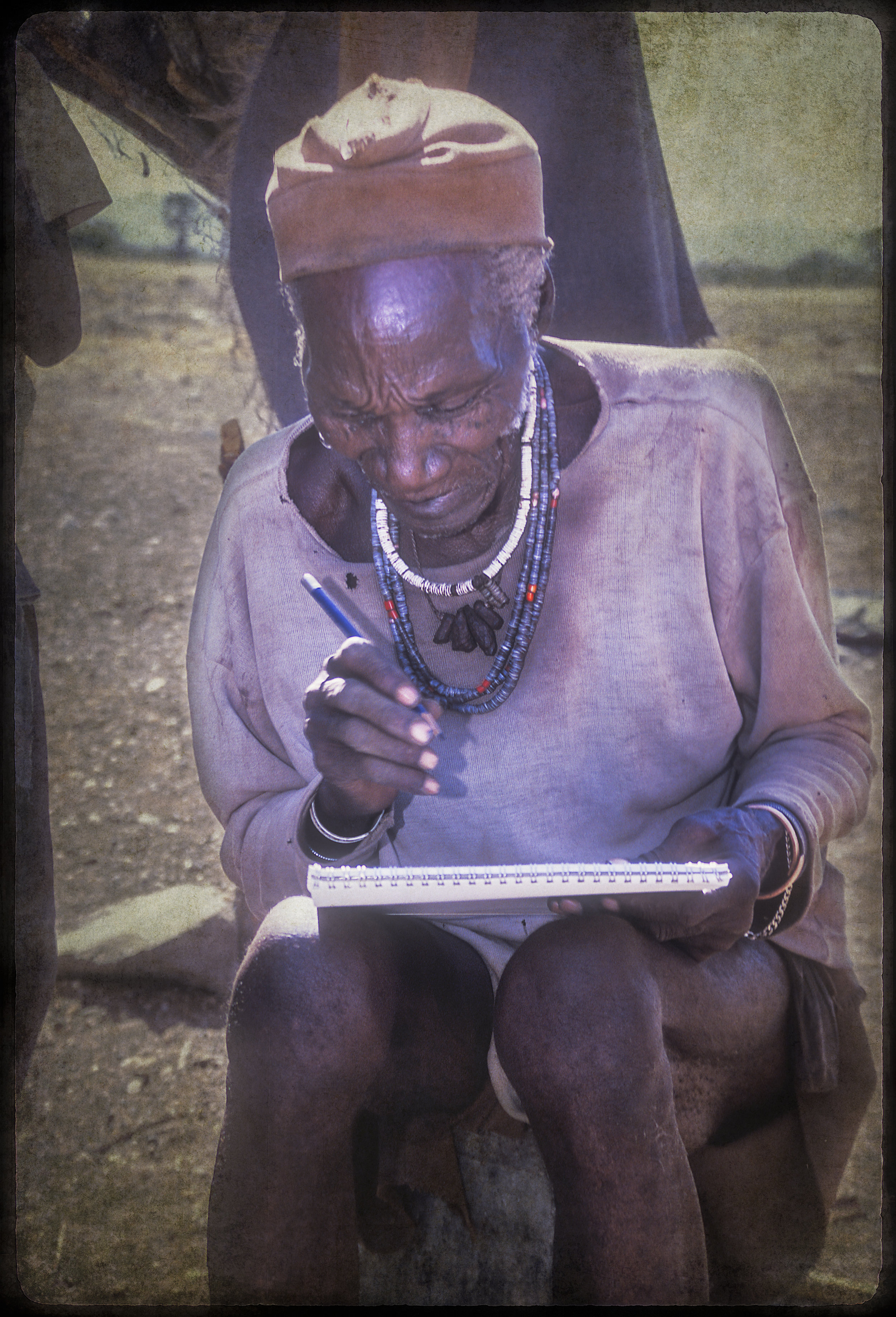 Himba medicine man draws his vision during trance
