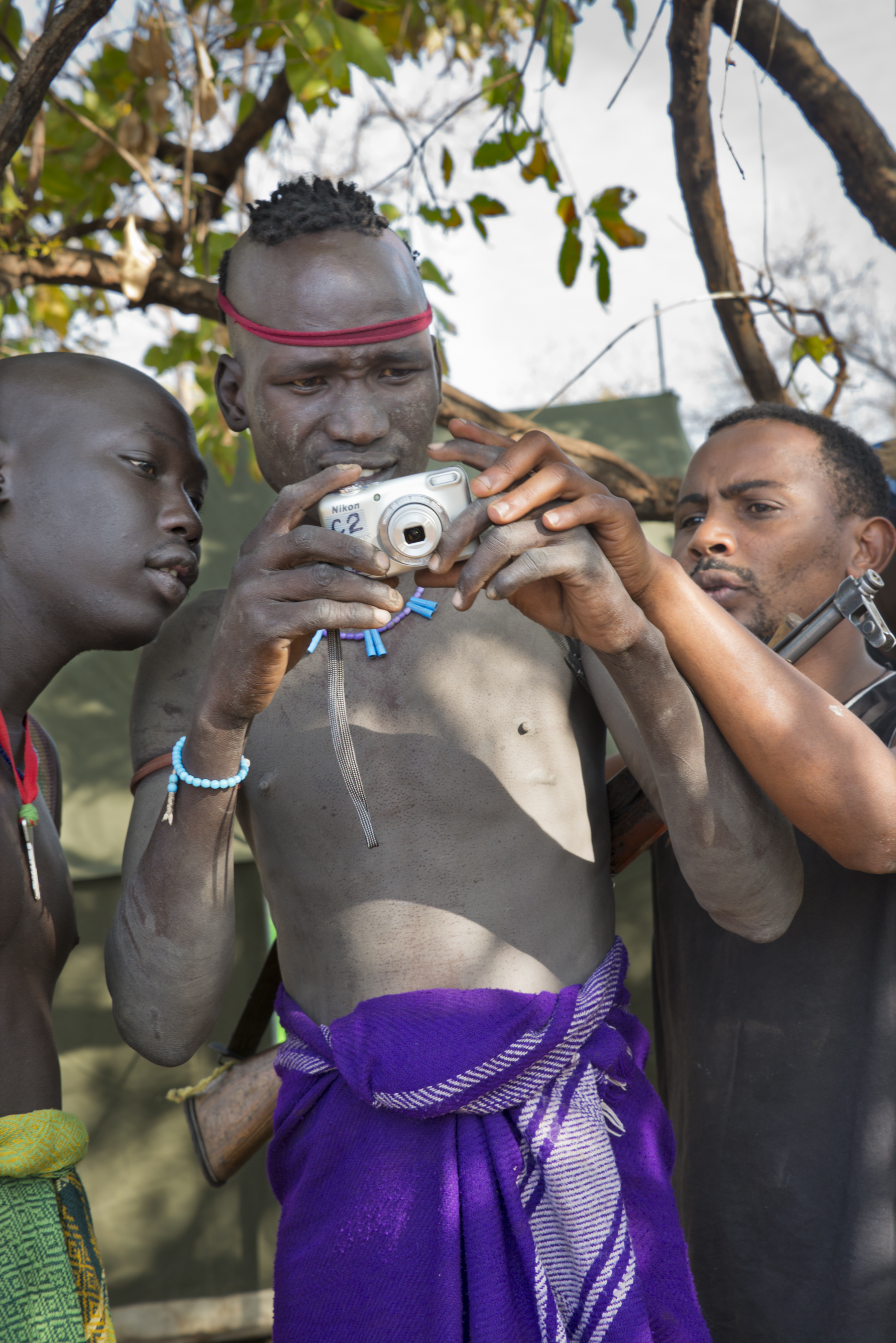 Mursi warriors learn photography