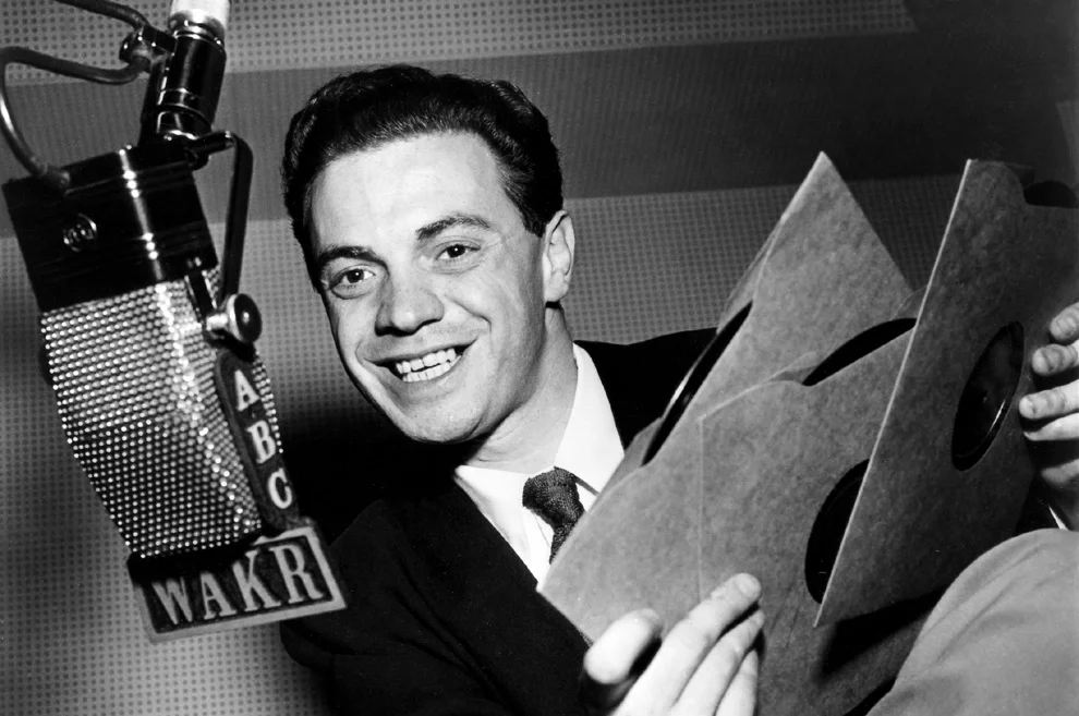 Radio DJ Alan Freed is widely credited with using the phrase "rock 'n' roll" to describe his mix of music.