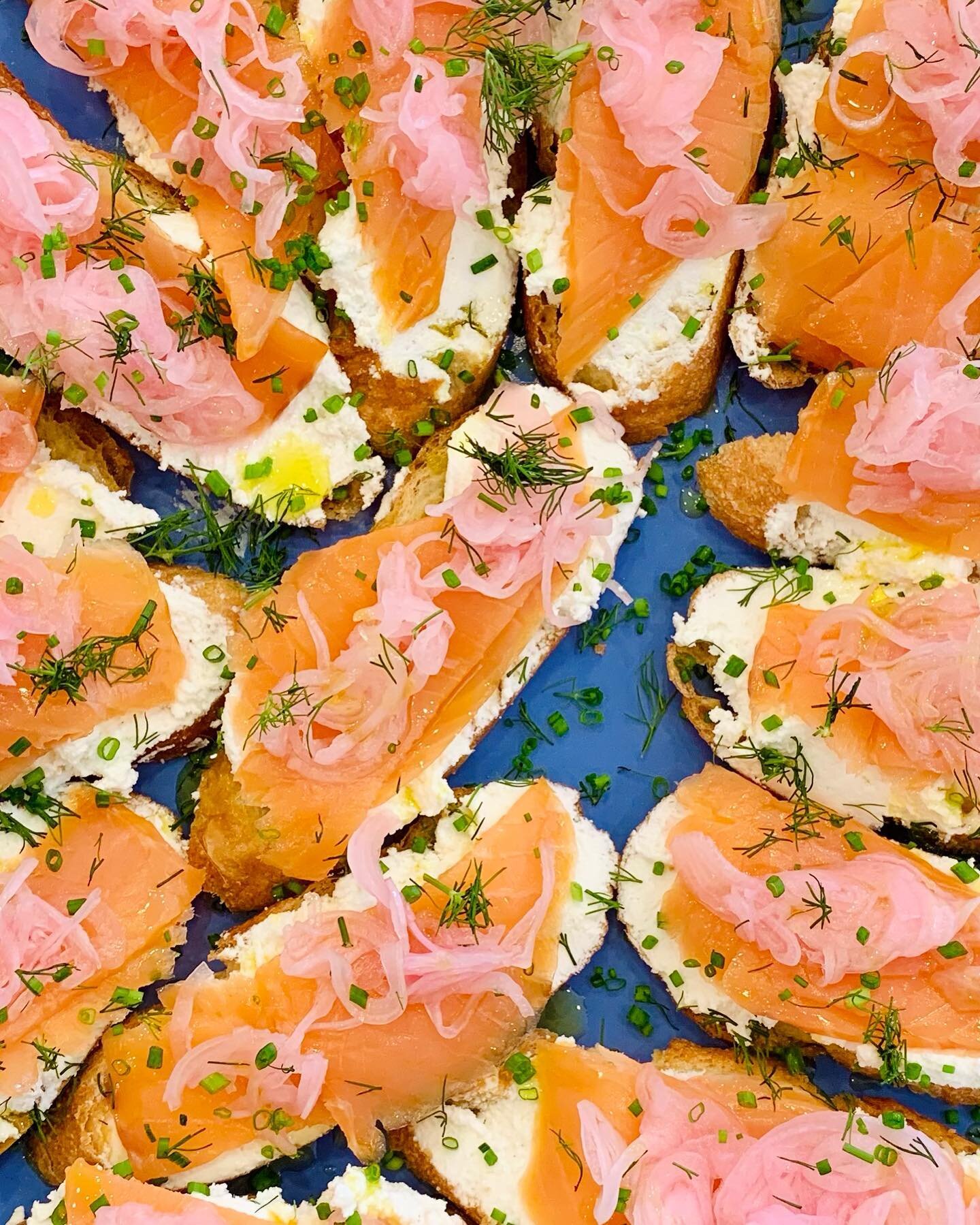 Smoked Salmon Tartines With Whipped Goat, Pickled Shallot, Chive &amp; Dill. Crostini/Tartine/Bruschetta - whatever the toast - it&rsquo;s always @albemarlebakingco 🥖
#cvillebachelorette #pickledshallots