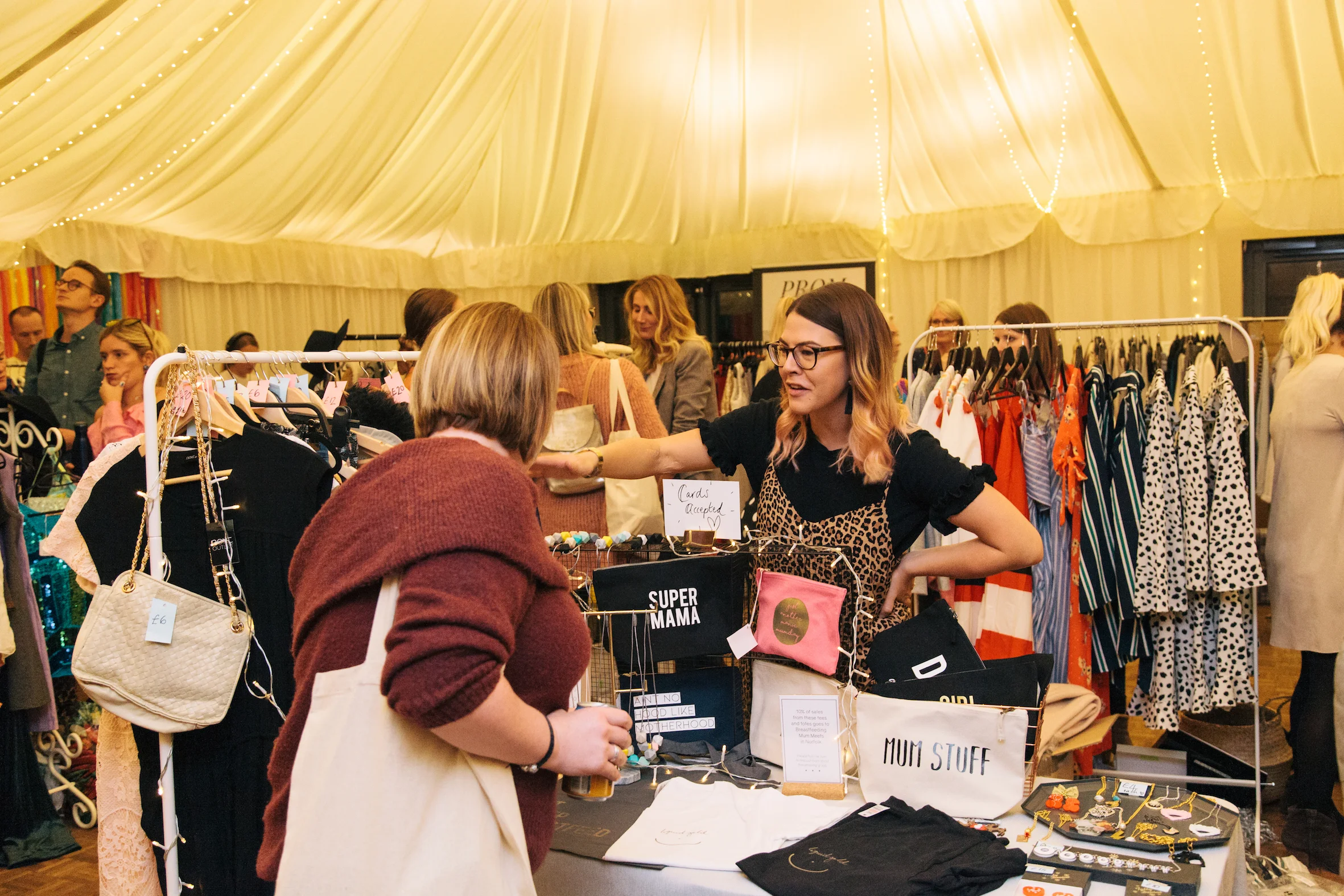 Sophie at The Night Feed with her preloved rail and shop stock, photo by Emily Gray Photography