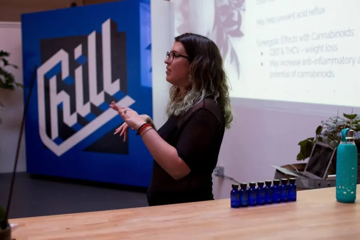 Emma Chasen teaching a room full of interested students about terpenes Photo credit: @dopeafide