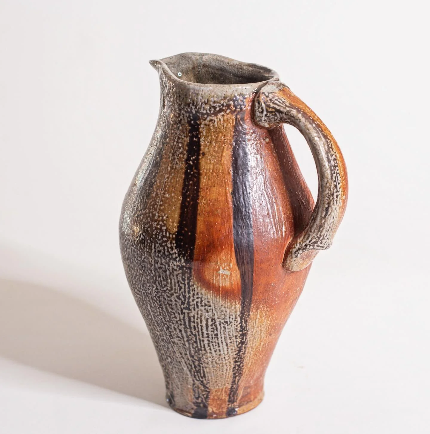 Pitcher with brush strokes and flash marks. 

@durhamcountypotterytour #pottery #sodafired #pitcher #friday #durham #madeinnc