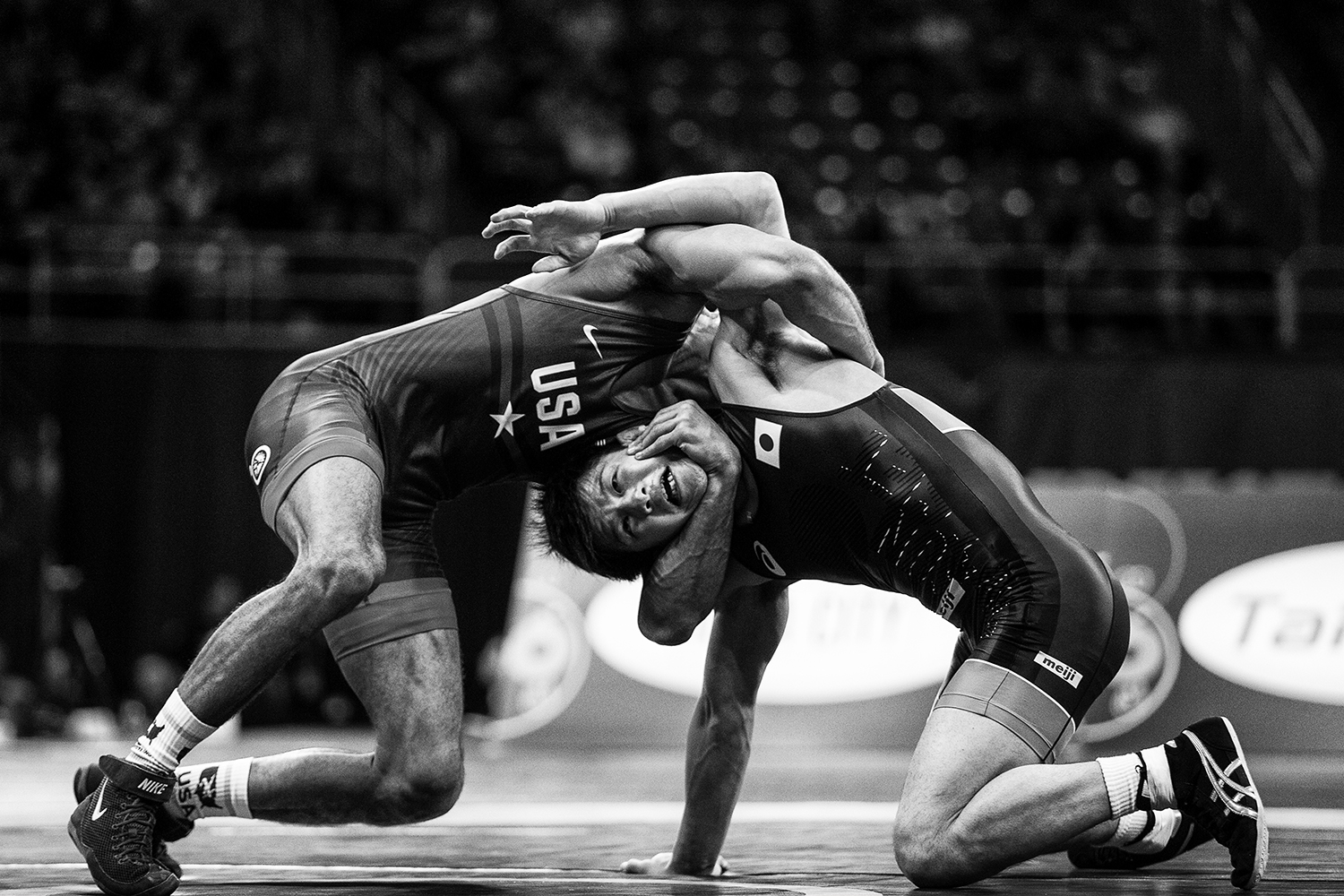  Japan's Kazuya Koyanagi, right, grapples with America's Kendric Maple at 61 kg during the 2018 Men's Freestyle World Cup at Carver-Hawkeye Arena in Iowa City on April 7, 2018. 