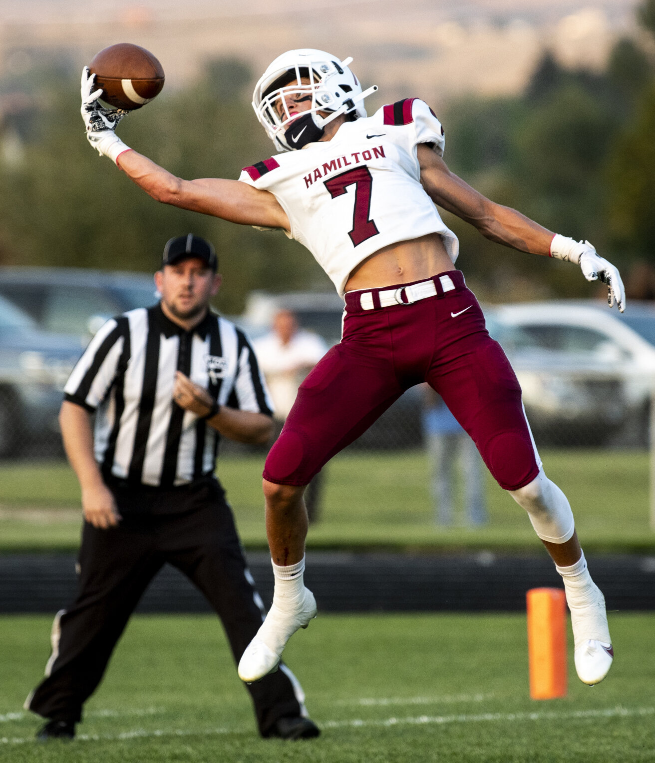  Hamilton’s Jaiden Klemundt makes a one-handed catch in the end zone for a touchdown during the Broncs’ game against Corvallis, Sept. 4, 2020 in Corvallis, Mont.. The Broncs defeated the Blue Devils, 53-6. 