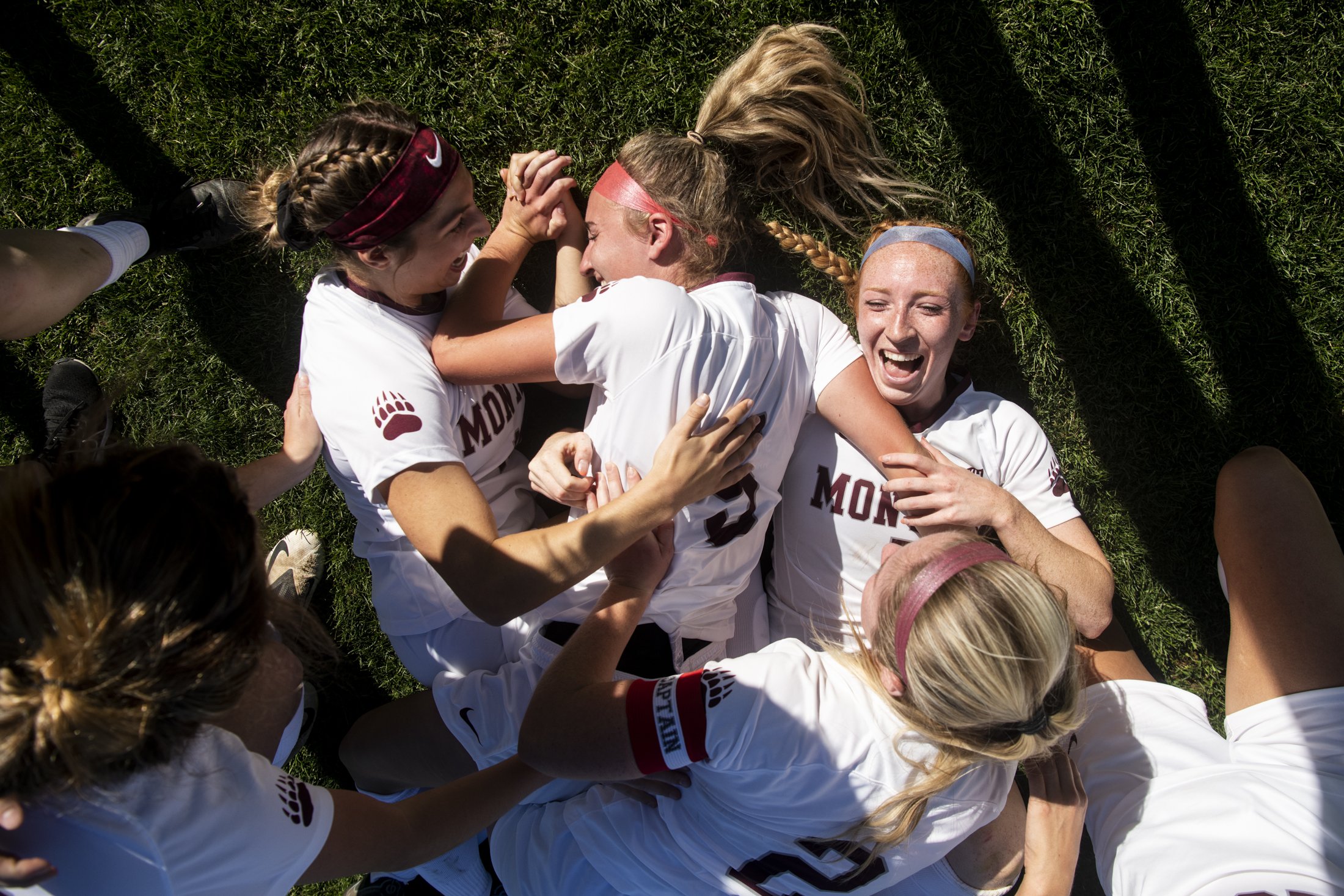  Montana’s McKenzie Kilpatrick, Ali Monroe, Sami Siems and Riley O’Brien celebrate their win over the Weber State Wildcats during the Big Sky Conference soccer championships in Greeley, Colorado, Sunday, Nov. 7, 2021. 