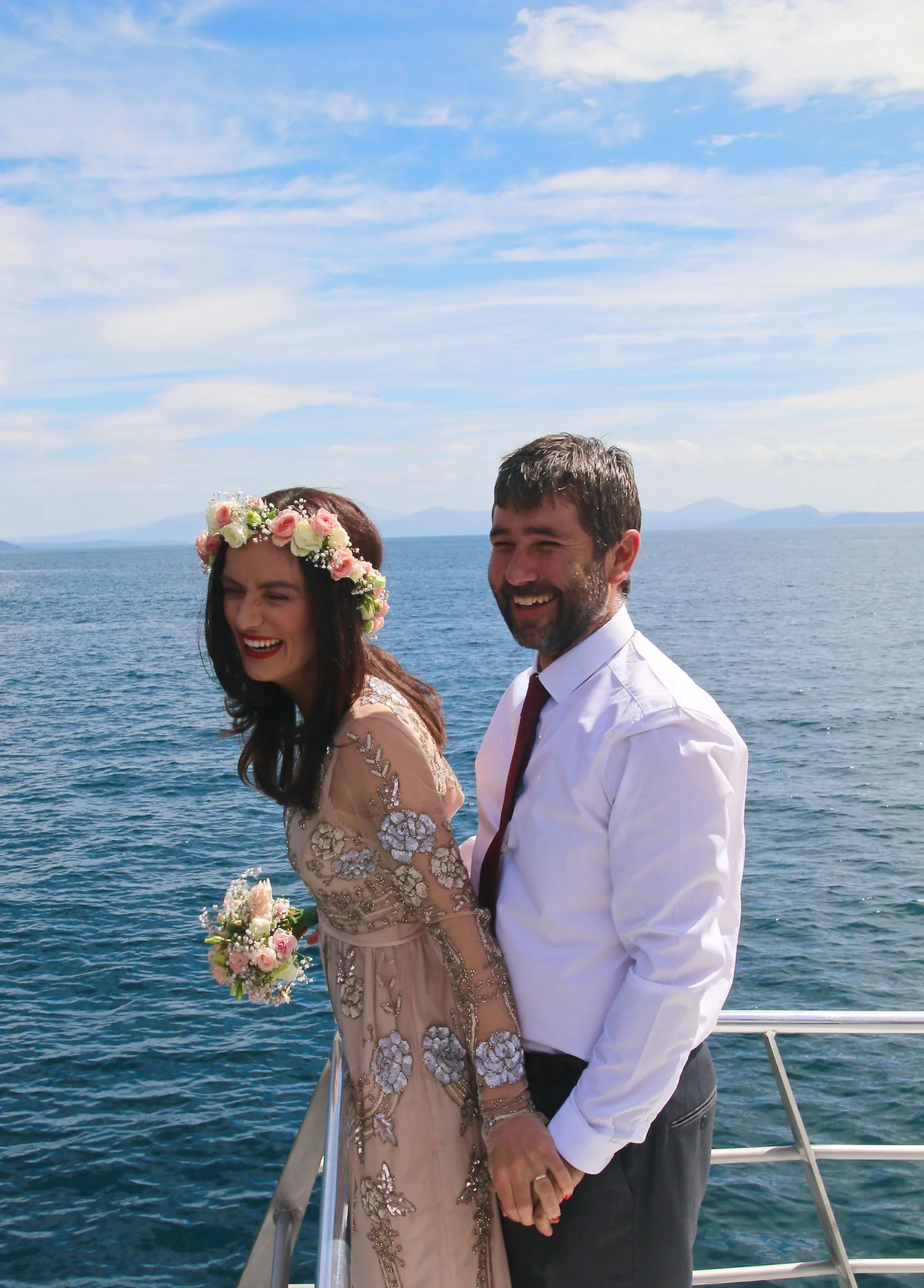 bride and groom on boat on Lake Taupo