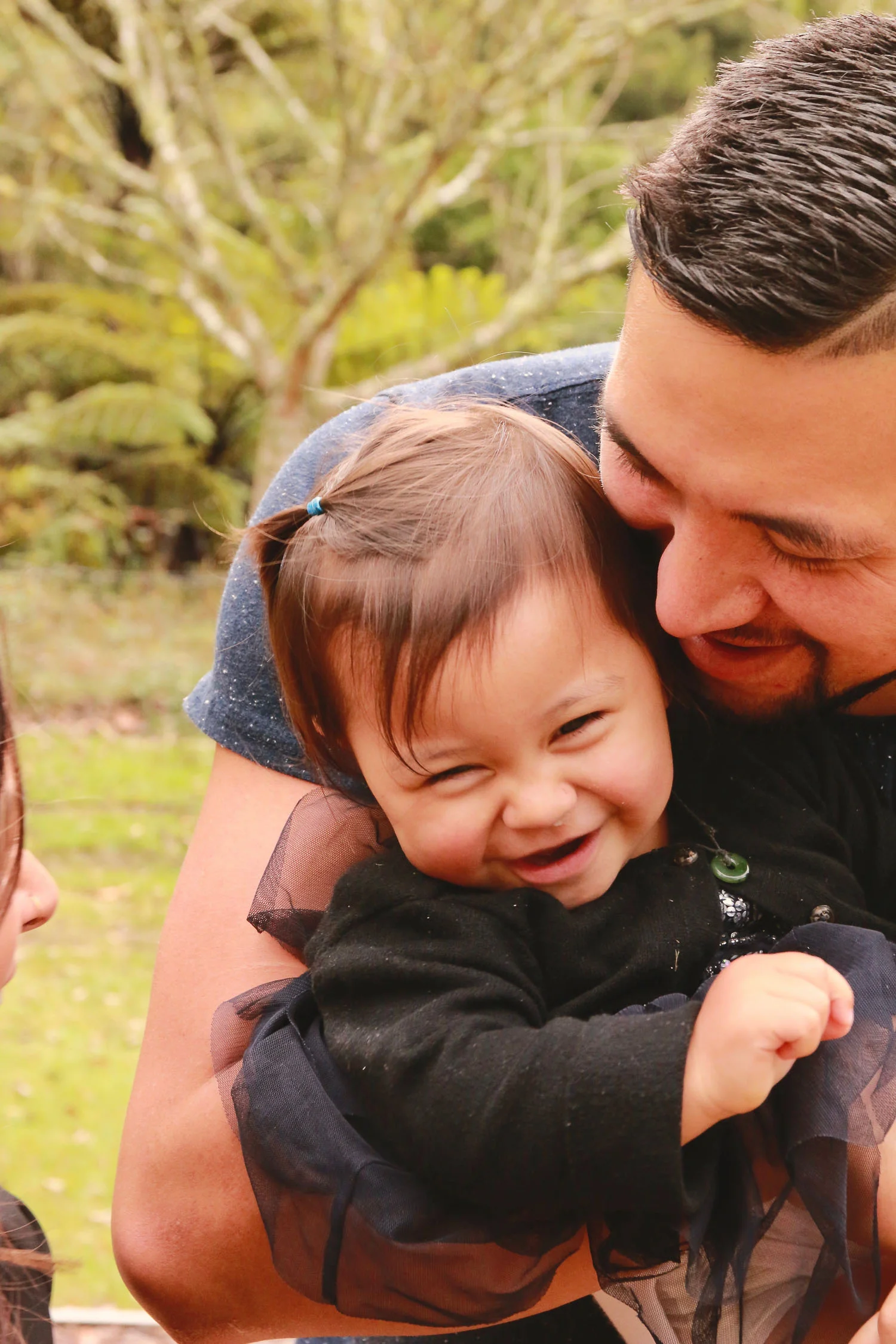 baby_girl_and_dad_lauhging_together_autumn_colours.jpg