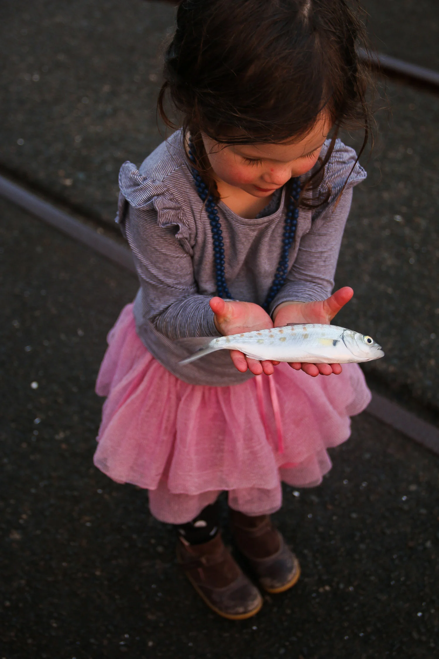 little-girl-winter-sunrise-first-catch.jpg