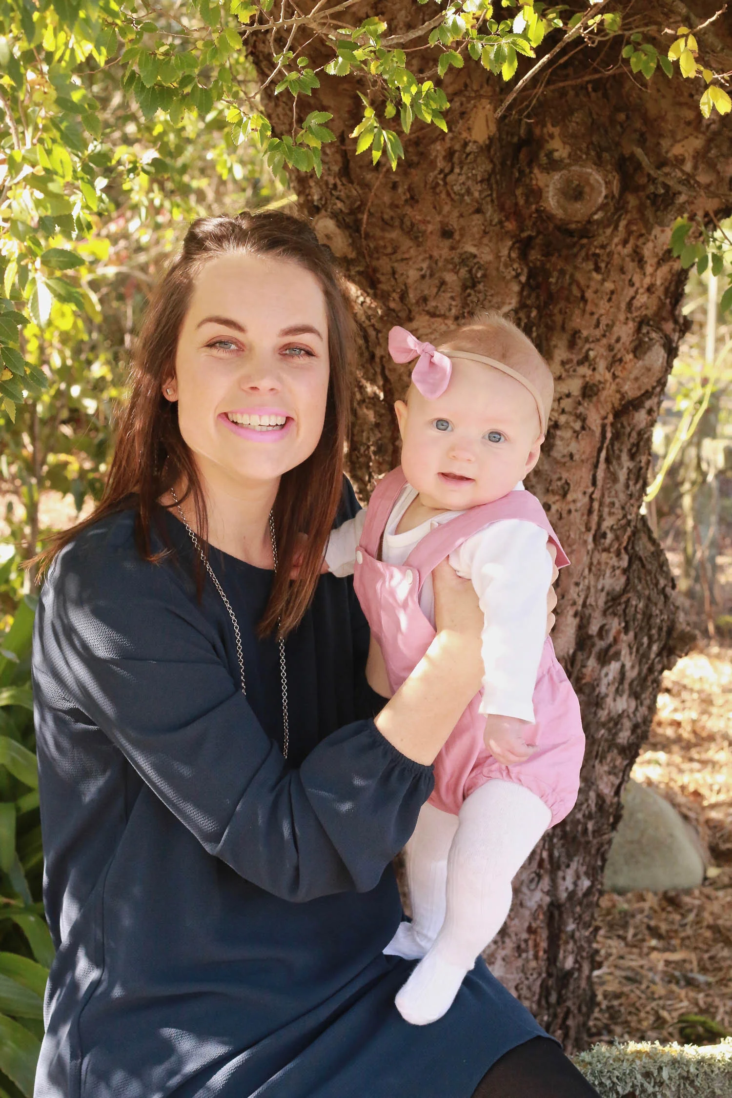 mummy-and-daughter-smiling-at-camera.jpg