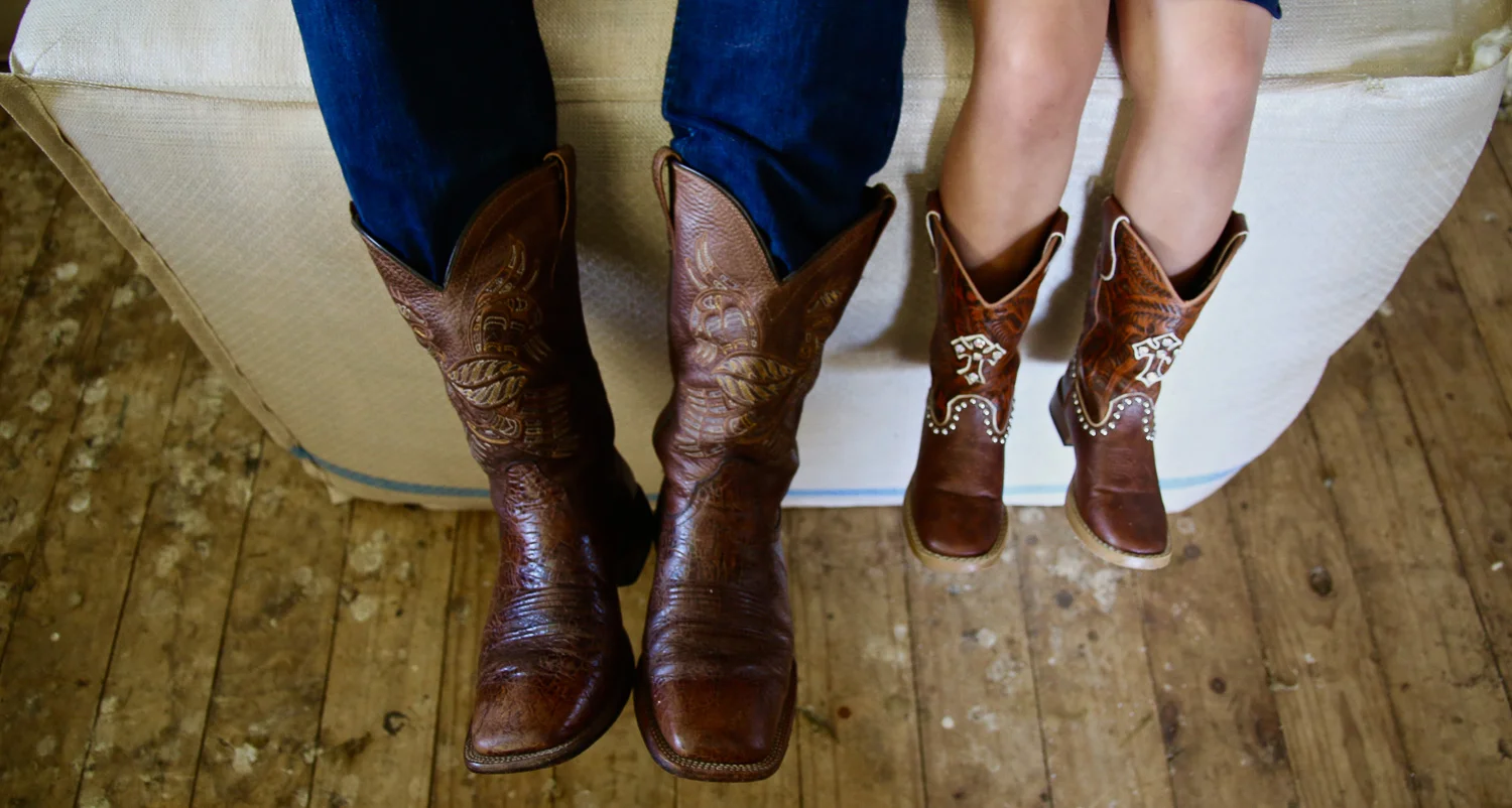 cowgirl-little-girl-and-cowboy-dad-boots-together_L-R.jpg