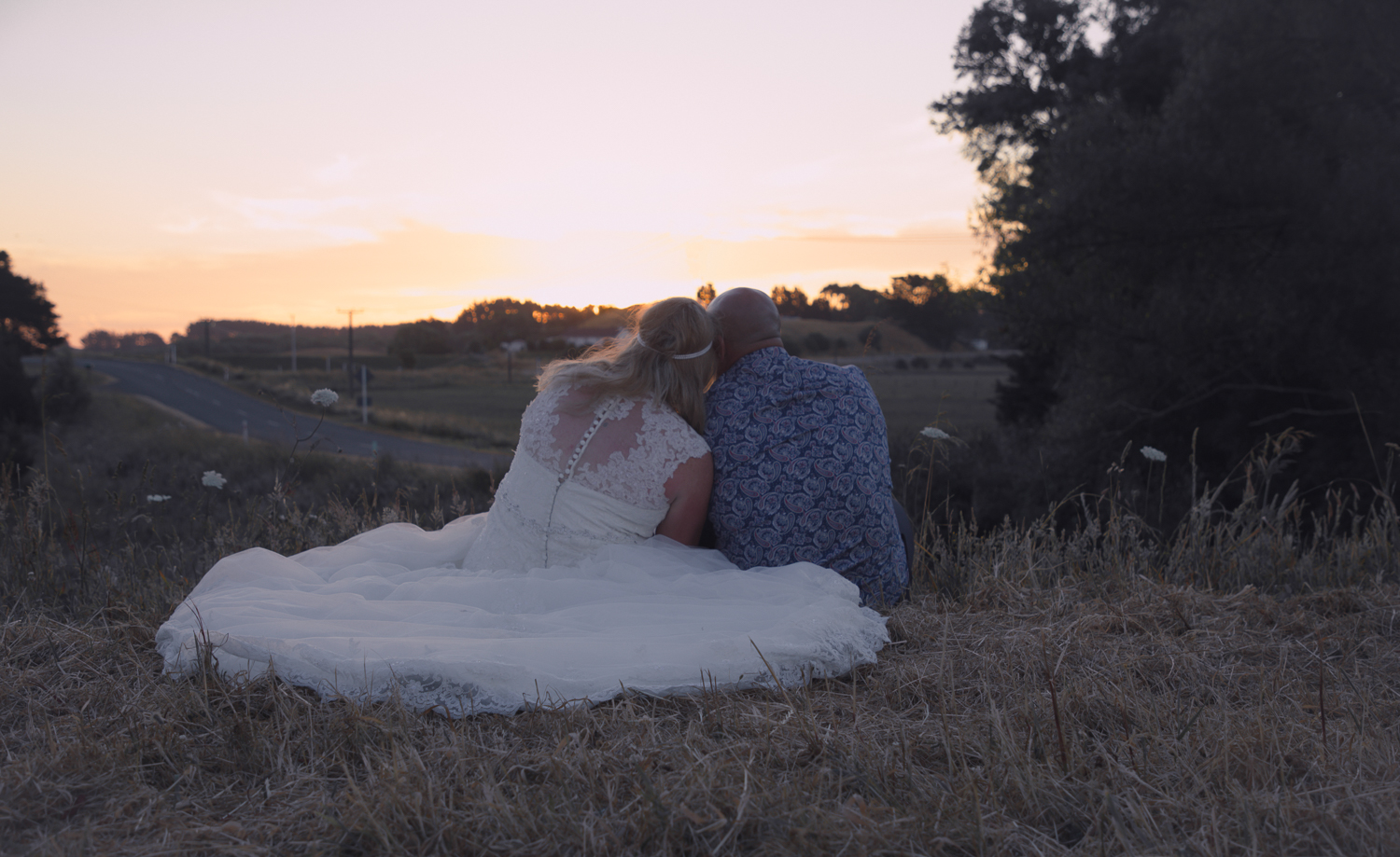 wedding-photography-bride-and-groom-watching-sunset-together.jpg