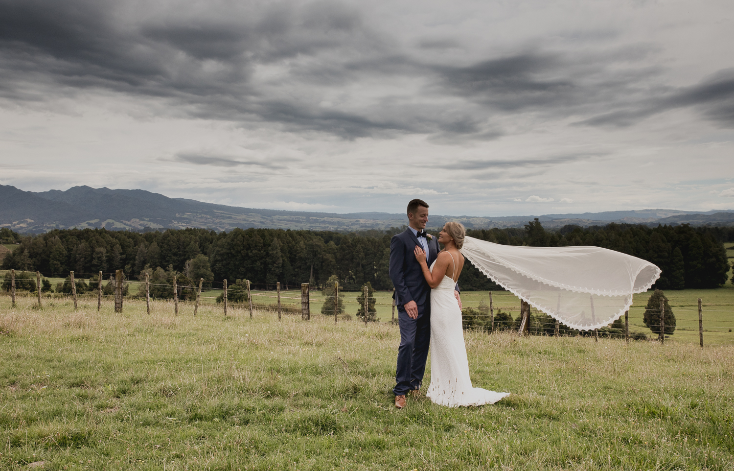 bride and groom with mt pirongia in background