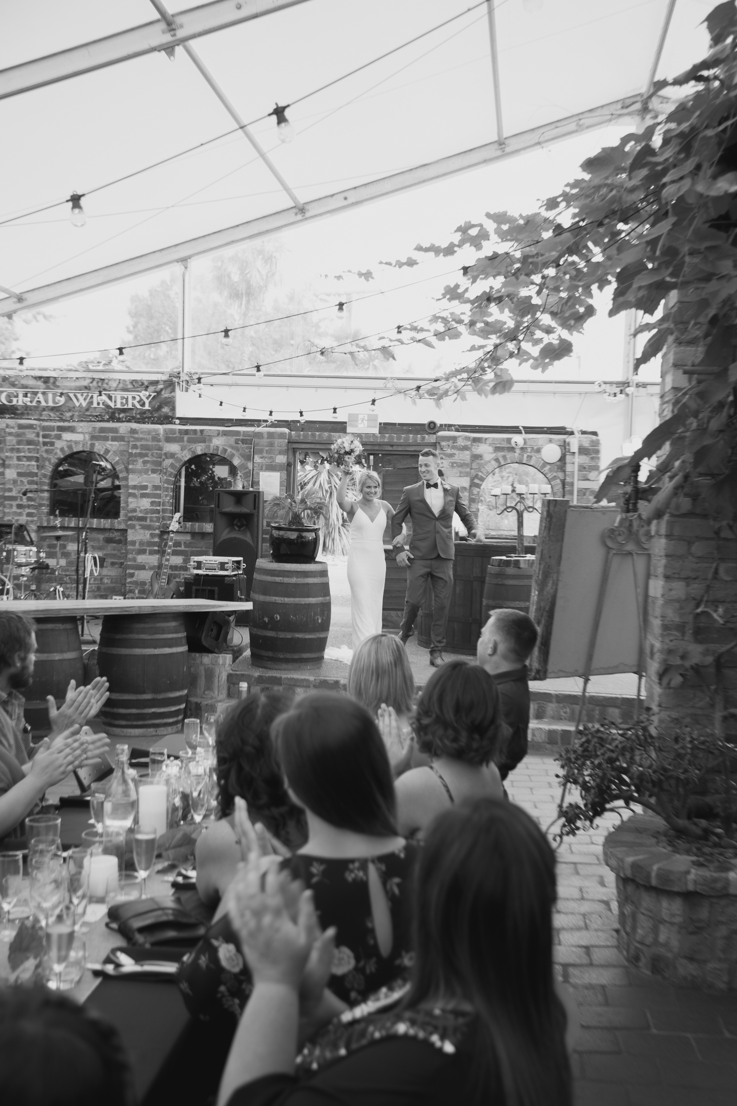 bride and groom arriving at reception