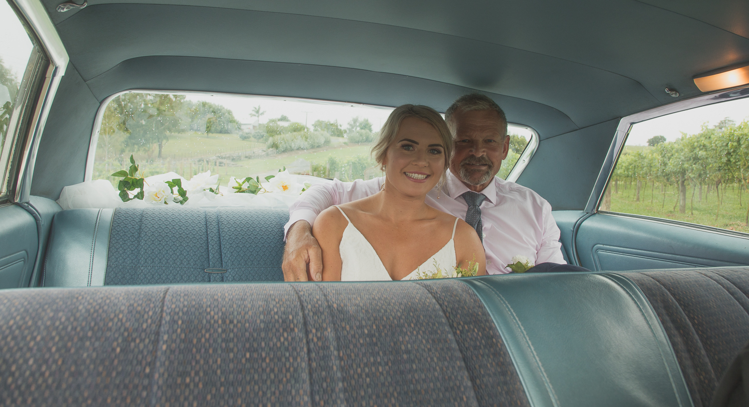 bride and father in wedding car