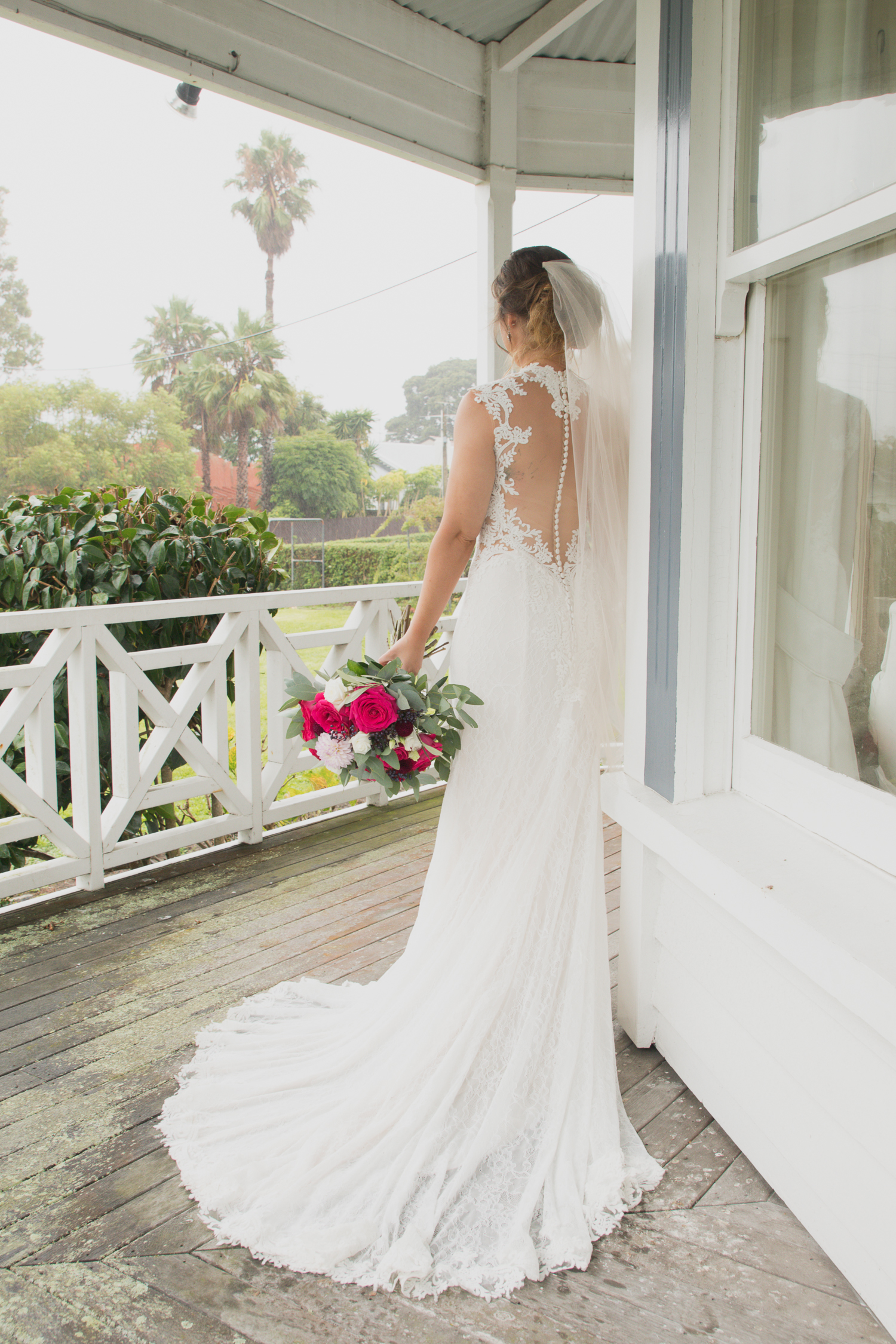 bride on villa veranda
