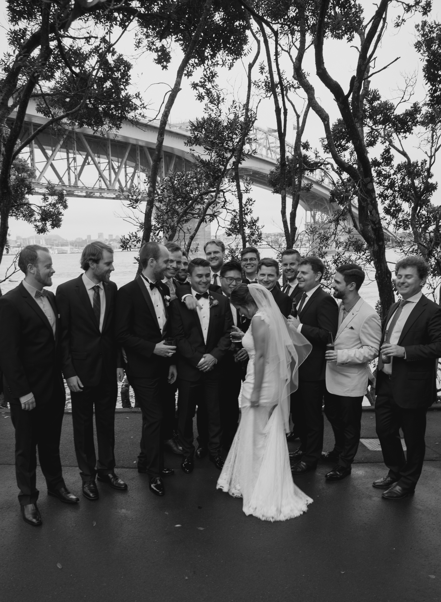 groom and groomsmen with bride