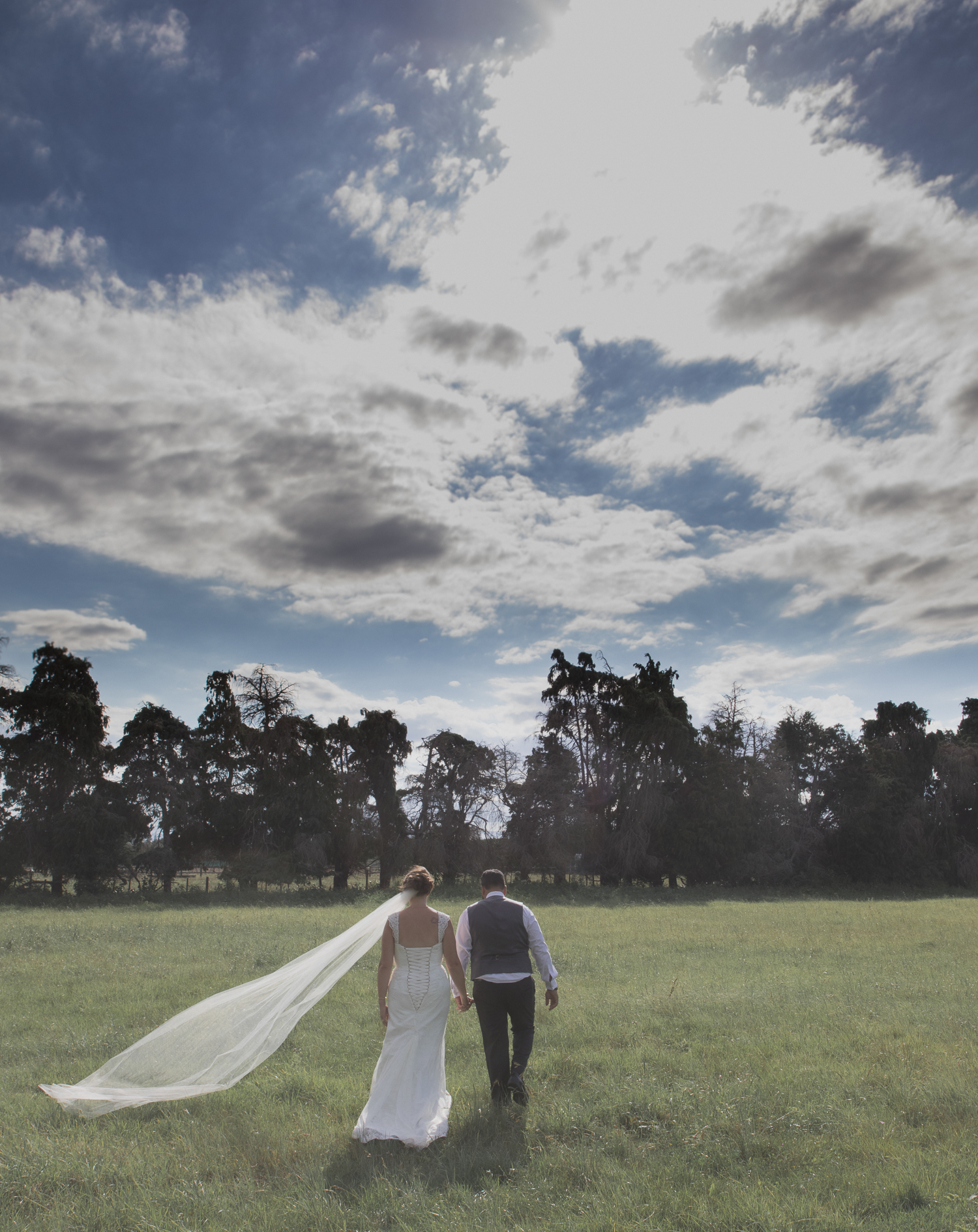 bride and groom walking together on wedding day